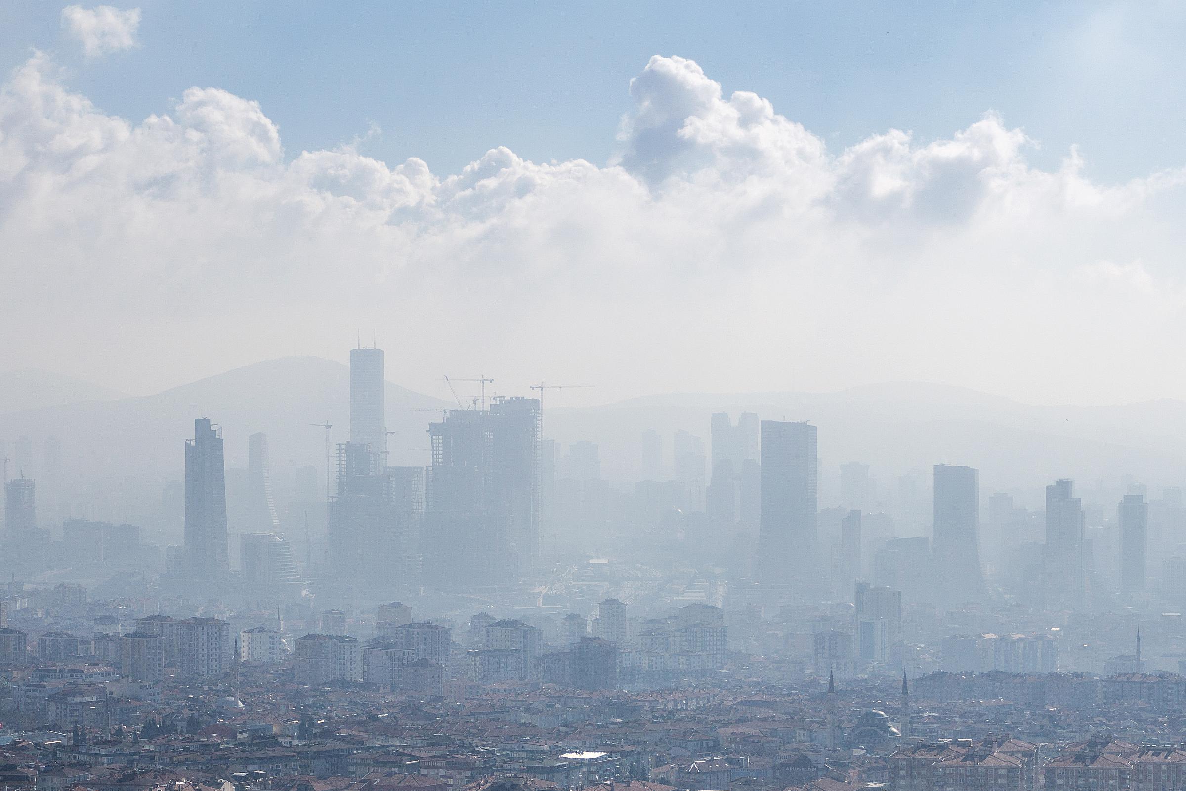 Salt Lake Valley covered by inversion, buildings barely visible through it