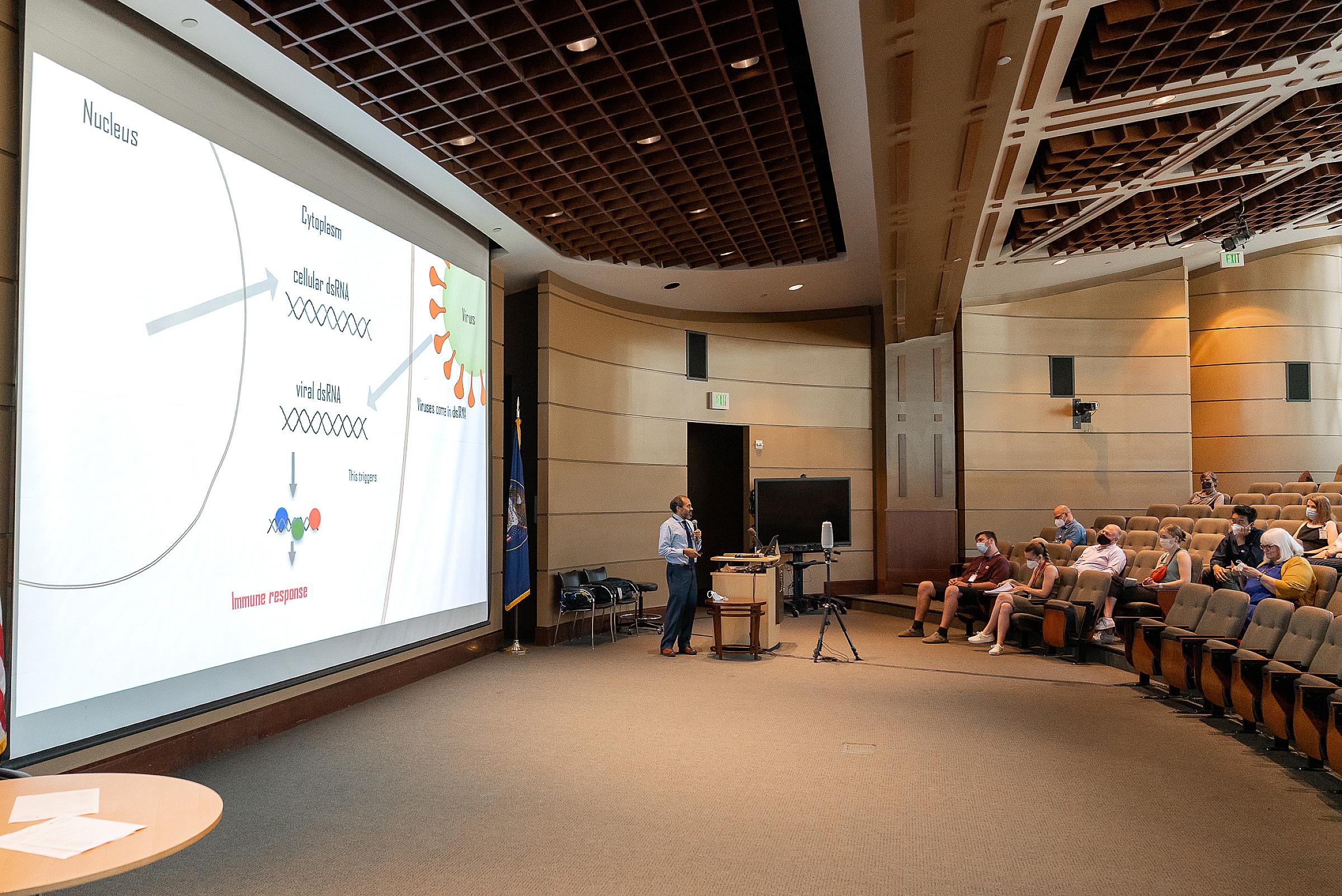Enrique gives a research presentation upon completing his first year in the PathMaker Bridge program.