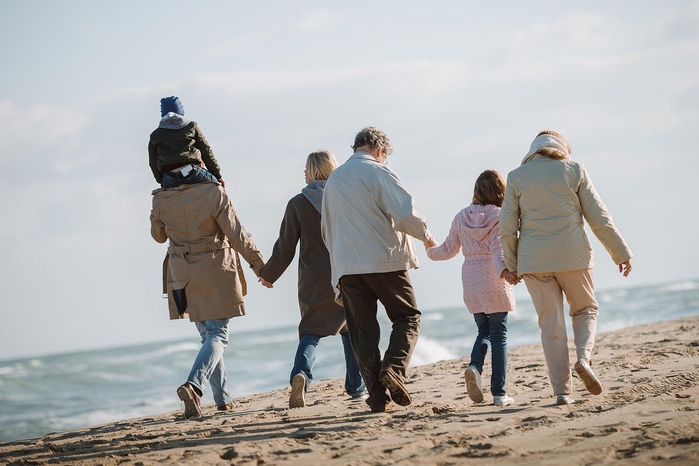Family walking on the beach