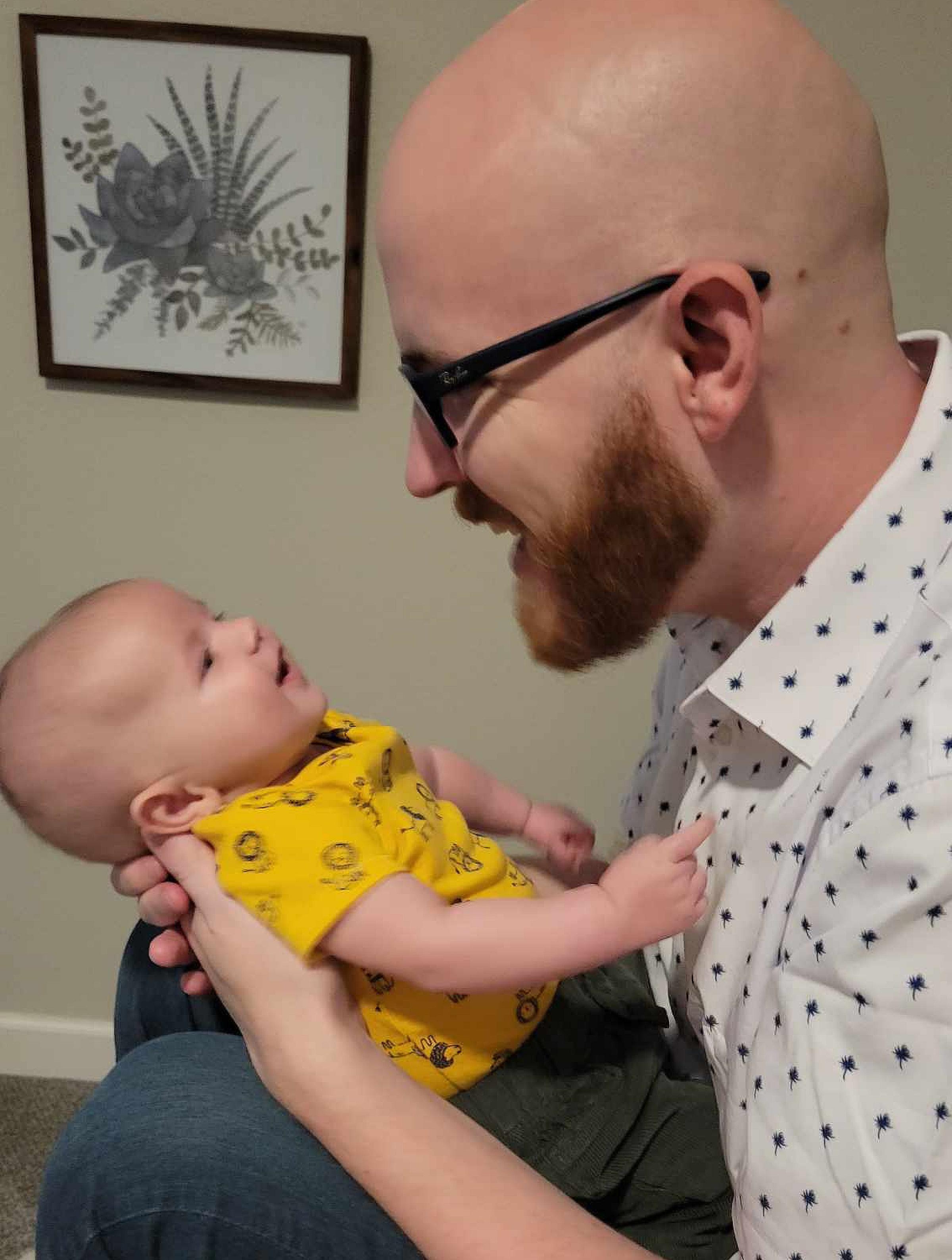 Ken Selden holding his baby, Carson, born March 2023