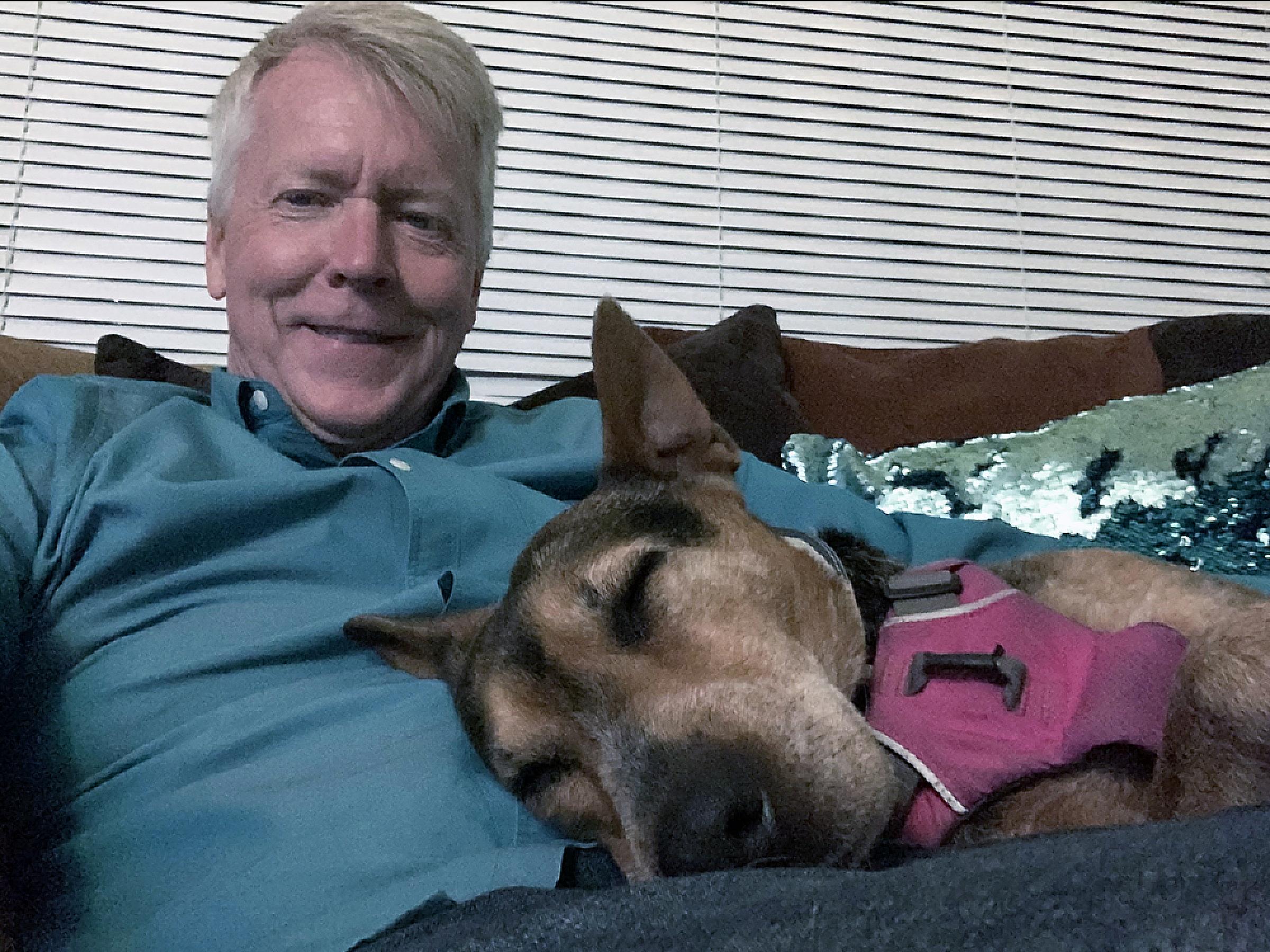 Jim and Luna sitting on a couch