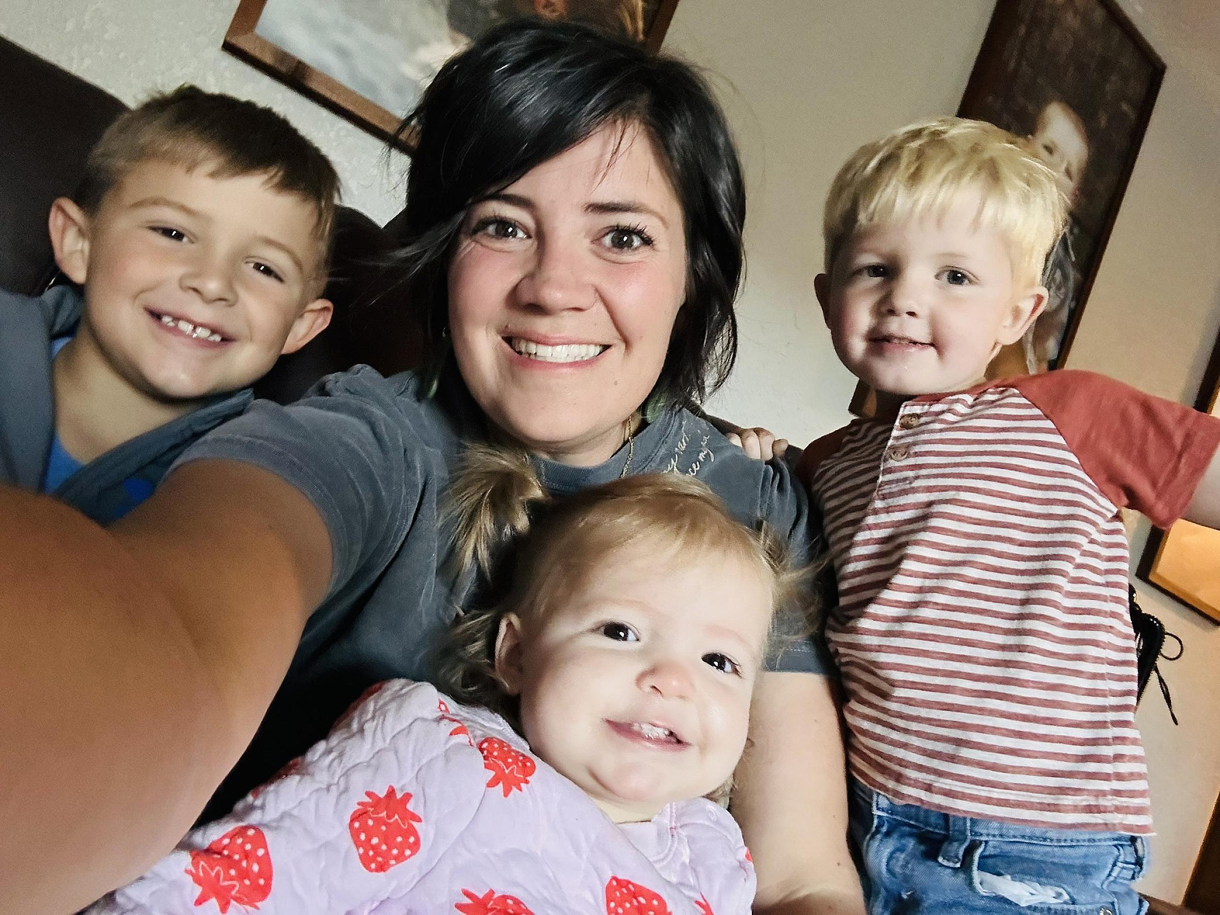 Kaci Popp with her children in 2024