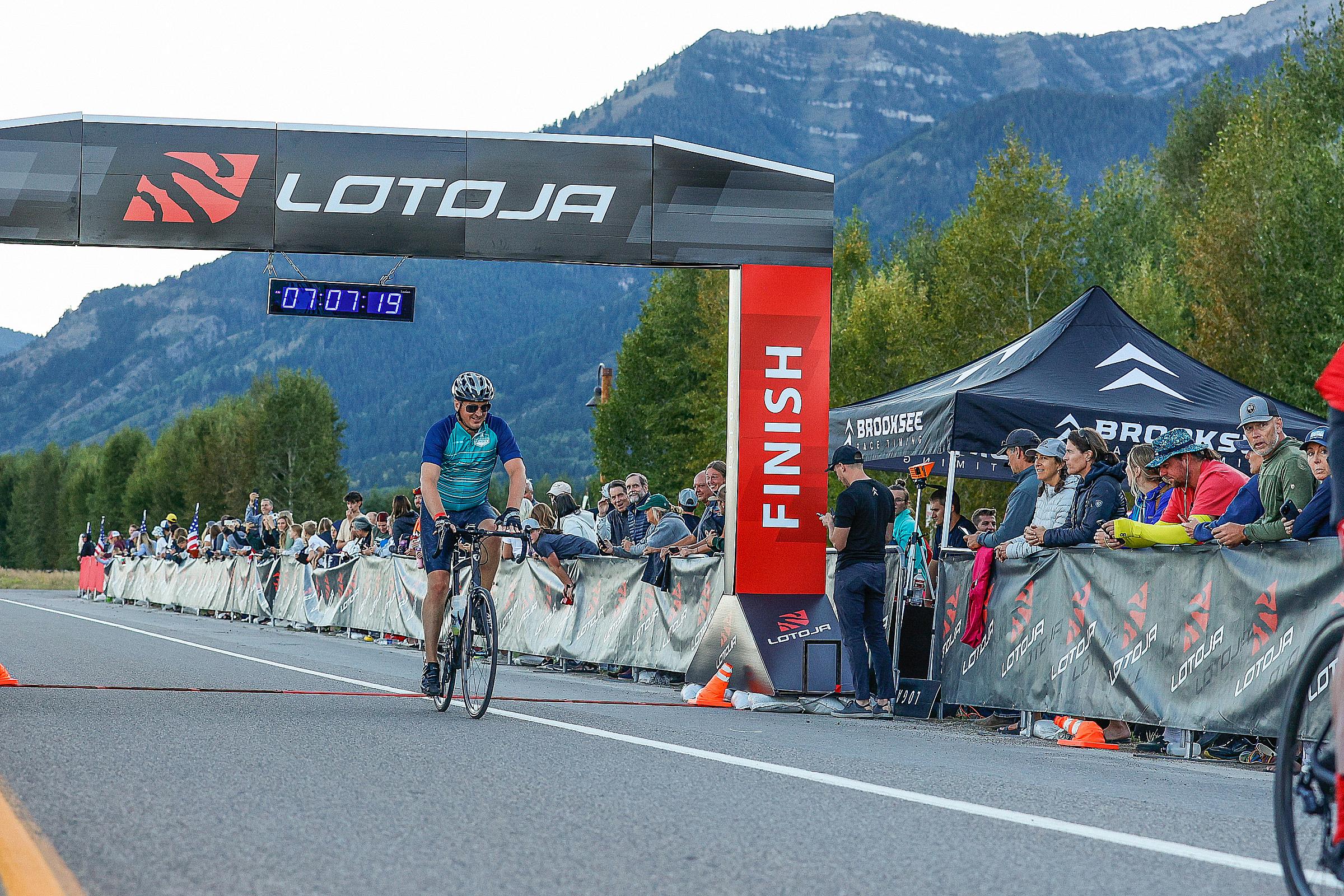 Brent Chambers crossing the 2023 LoToJa finish line in Jackson, Wyoming