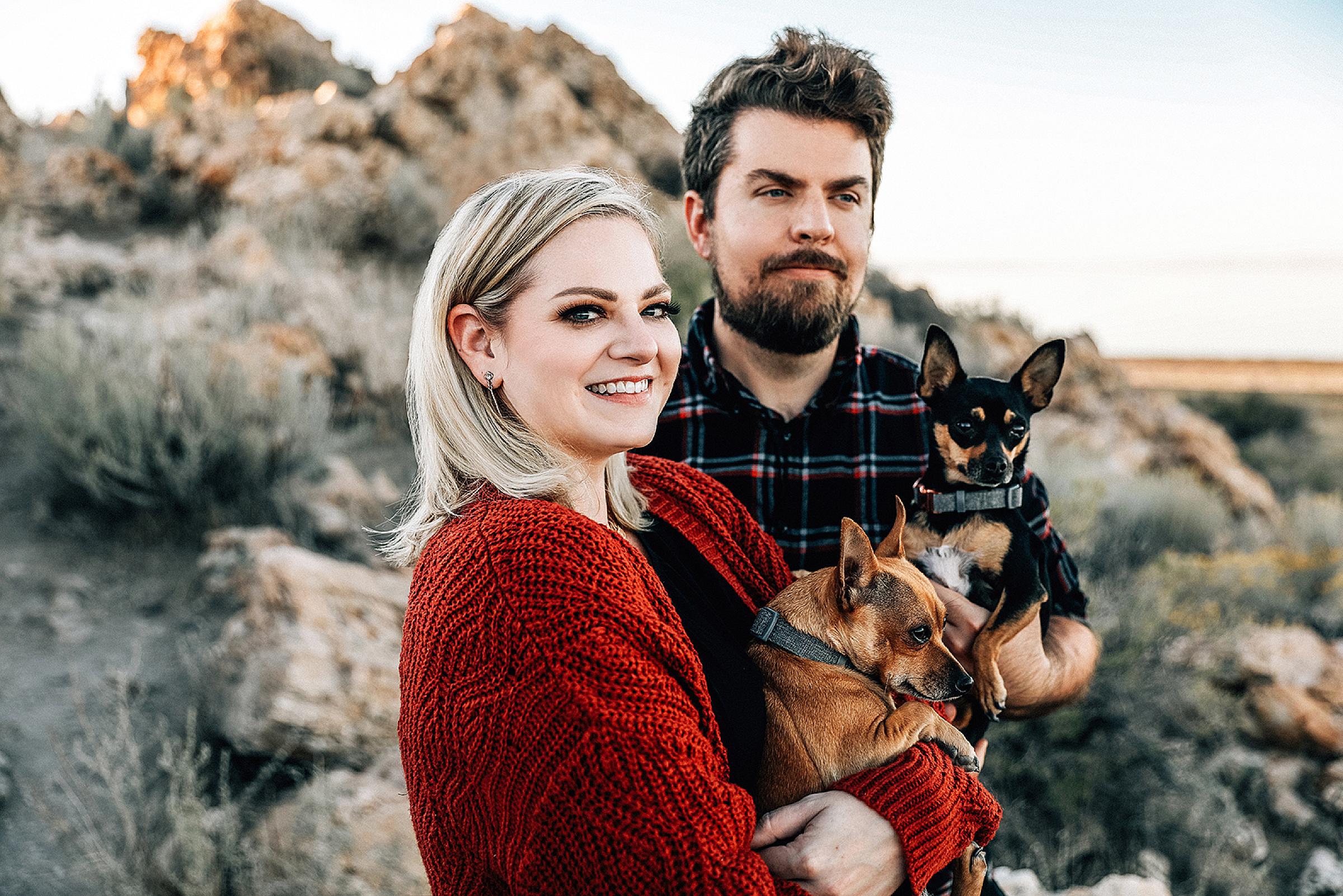 Shelli and David Armstrong holding their dogs