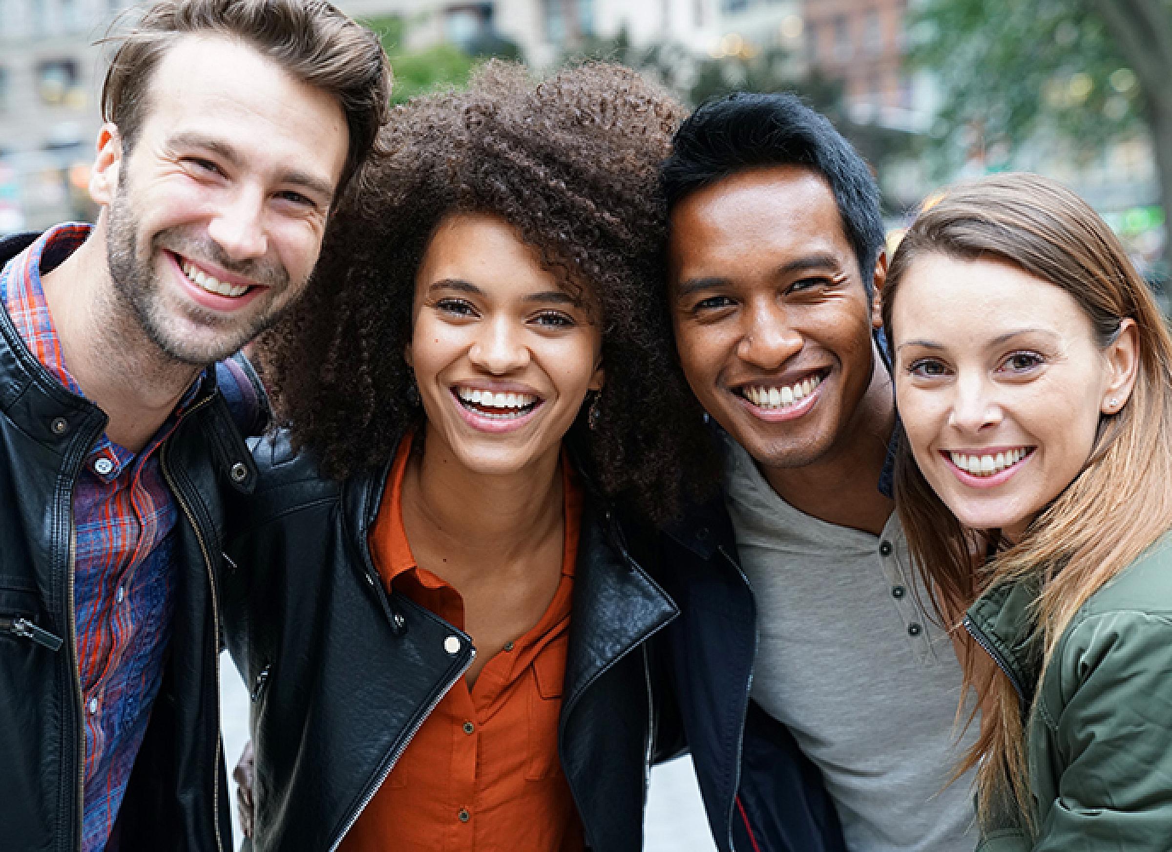 Four Young Adults Outside Group Photo