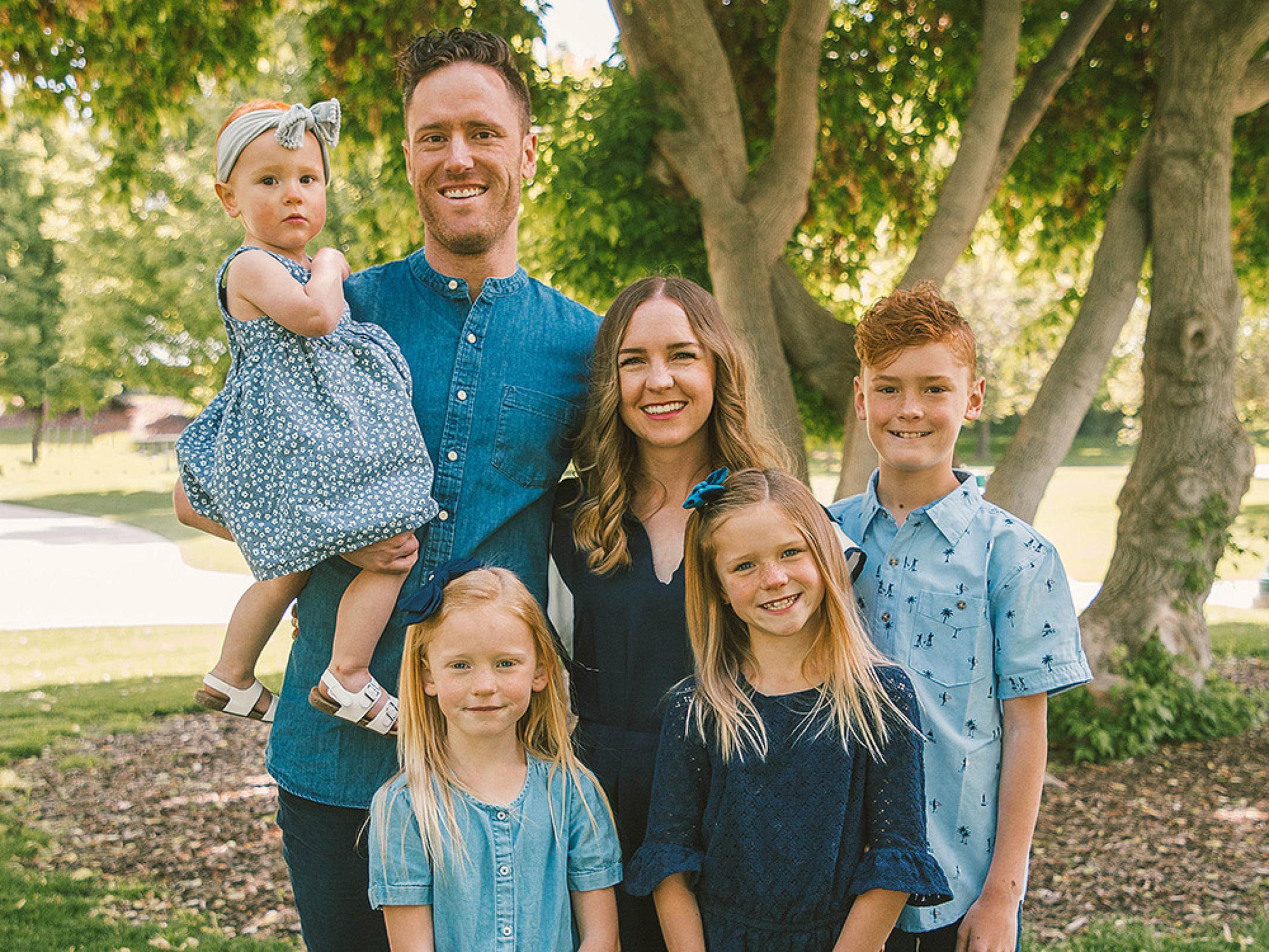 Chrissy Walker poses with her family