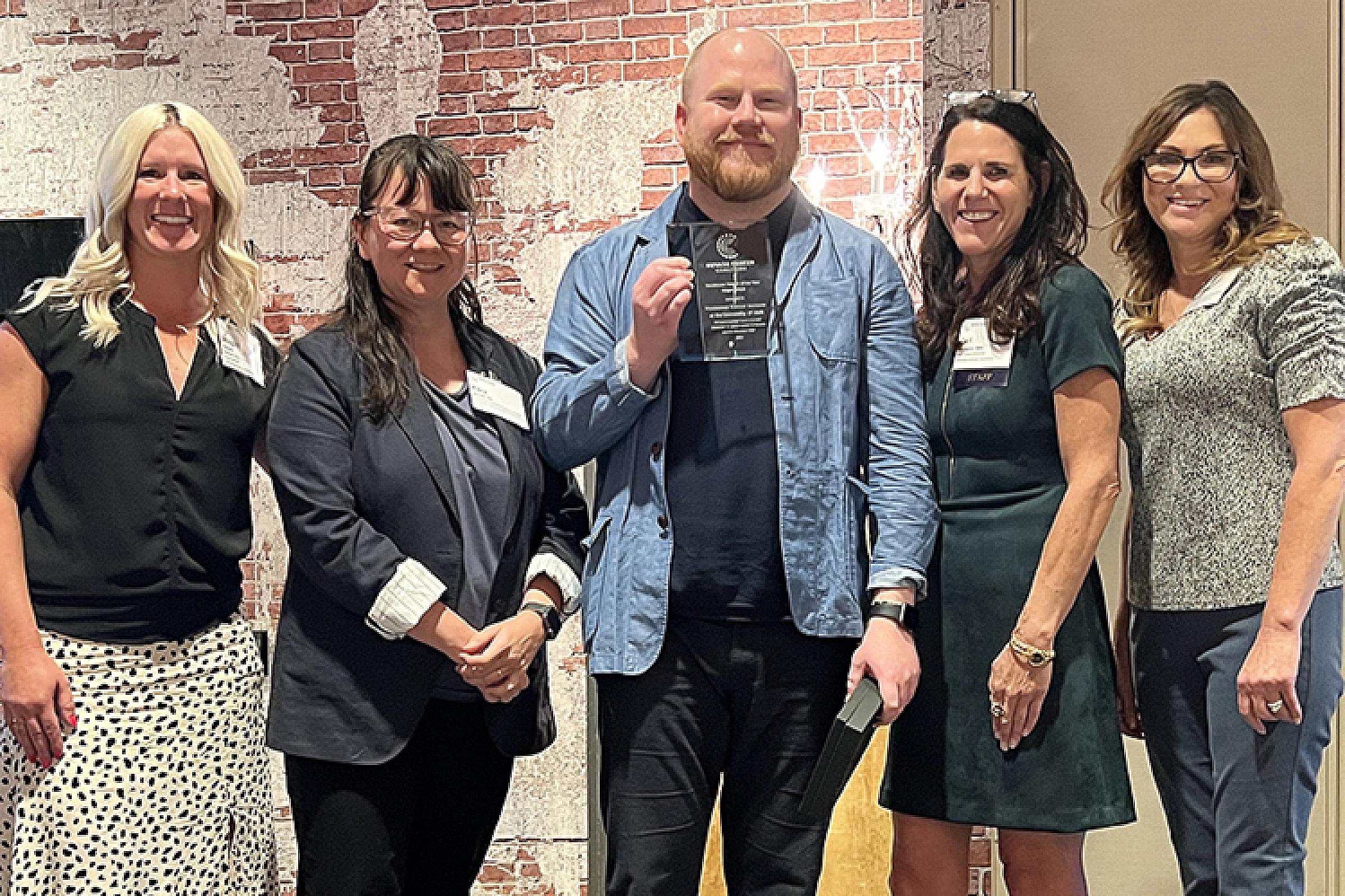 Megan Provost, Garrett Harding, and Kara Kikuchi with members of the Nevada Cancer Coaliton