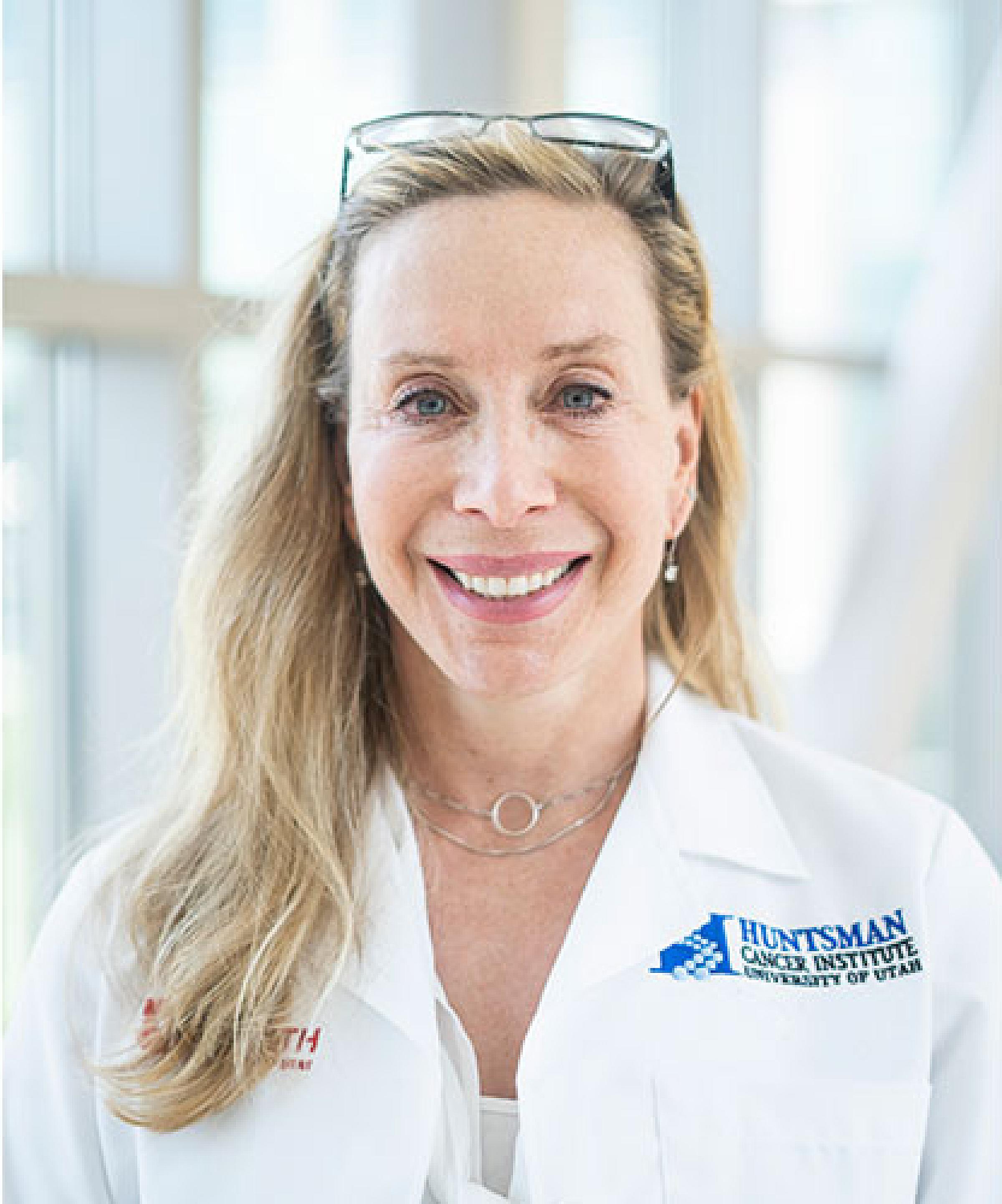 Tracy Onega in lab coat