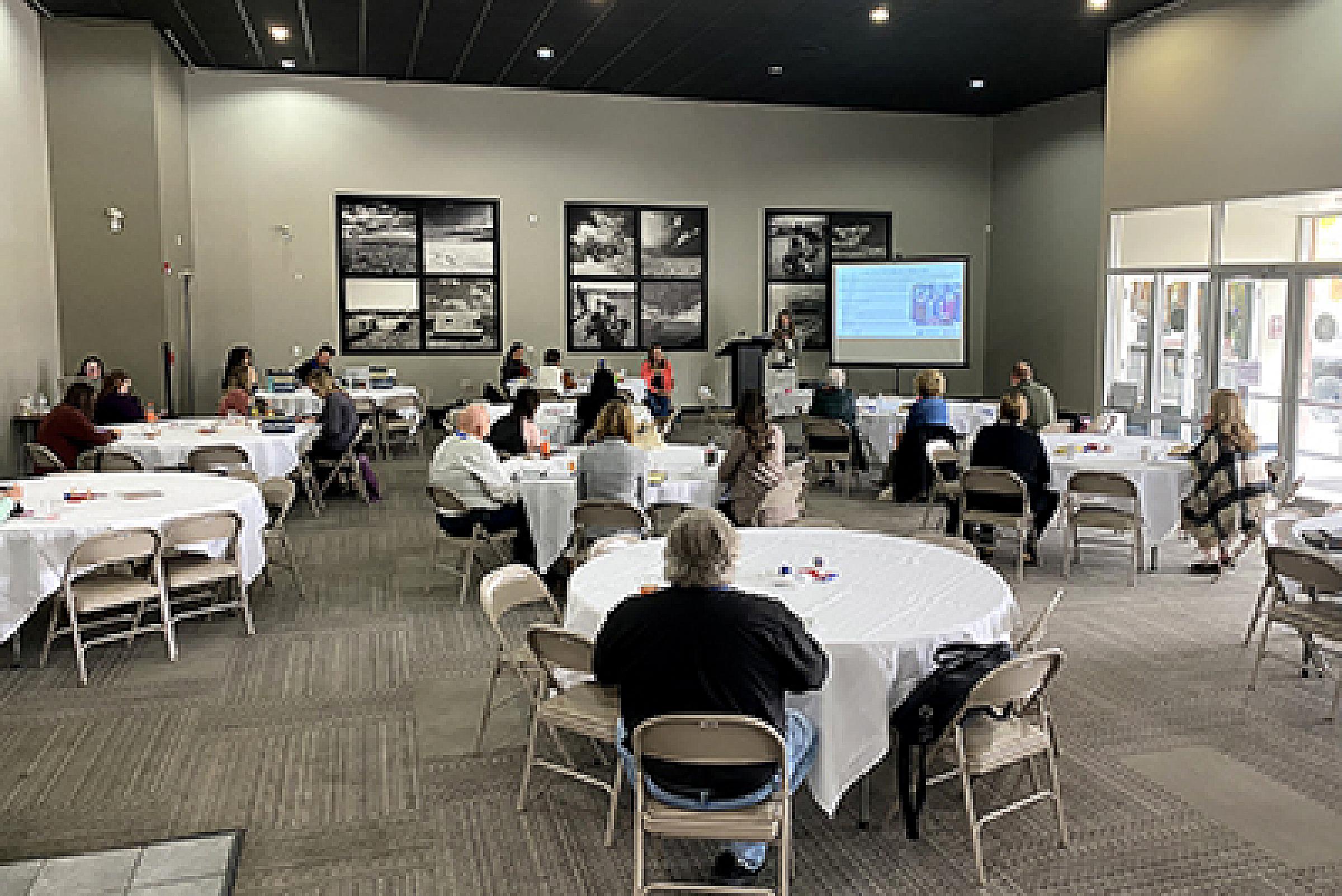 Chelsey Schlechter, PhD, speaks at the Wyoming Cancer Coalition semi-annual meeting