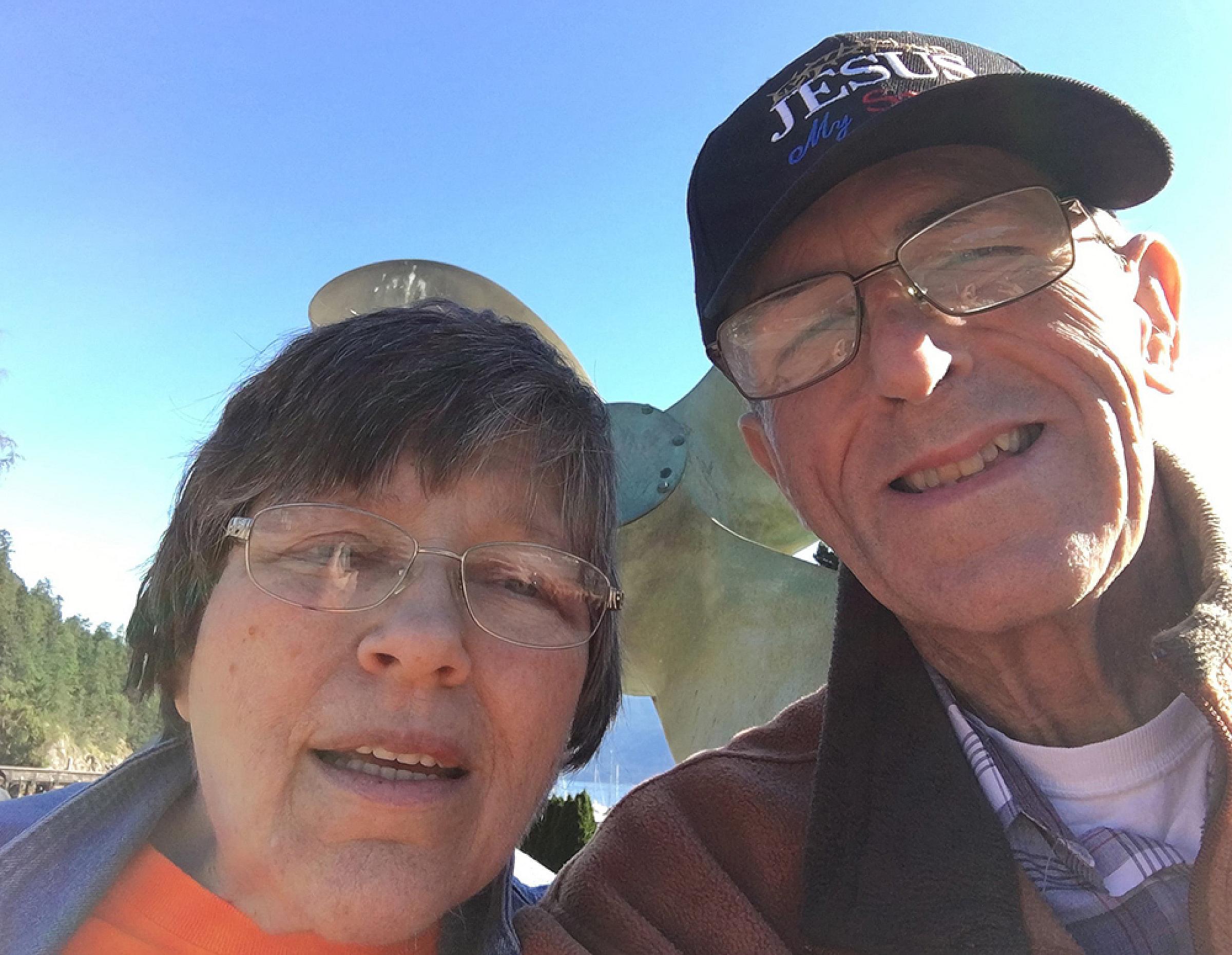 Robert Gamble and his wife outside