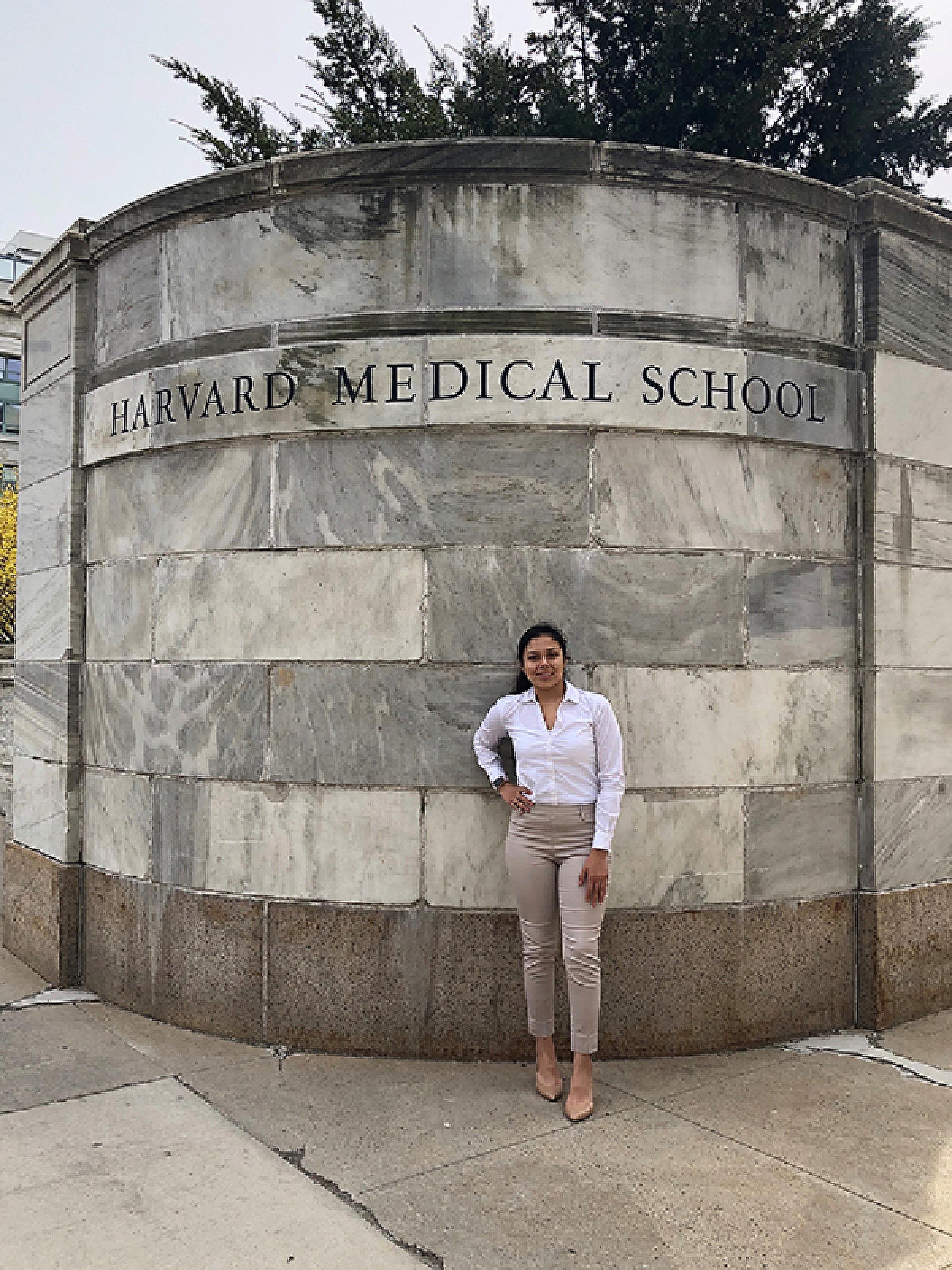 Dominique Pablito standing outside at Harvard Medical School