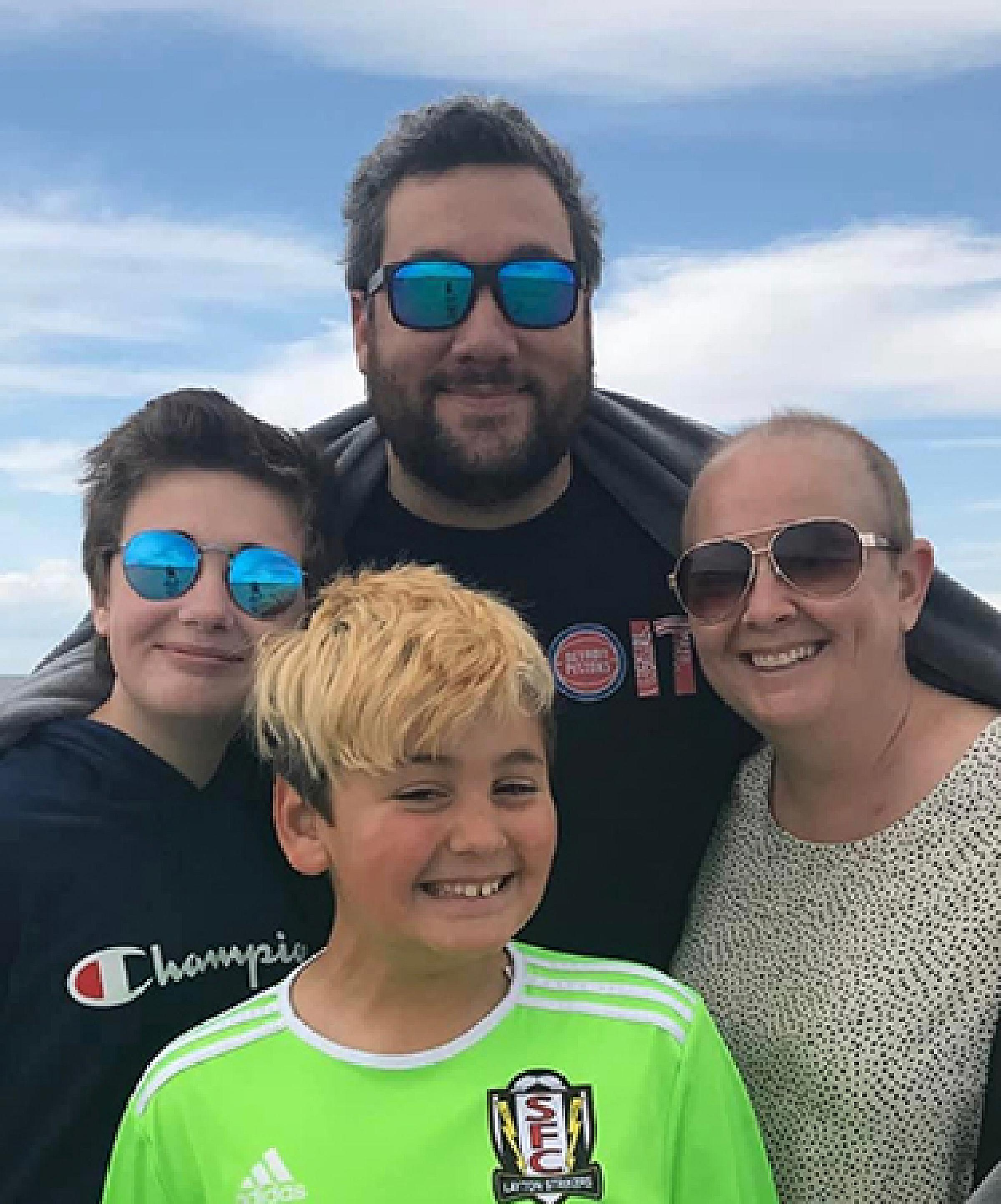 Jessica Rivera with her family outside