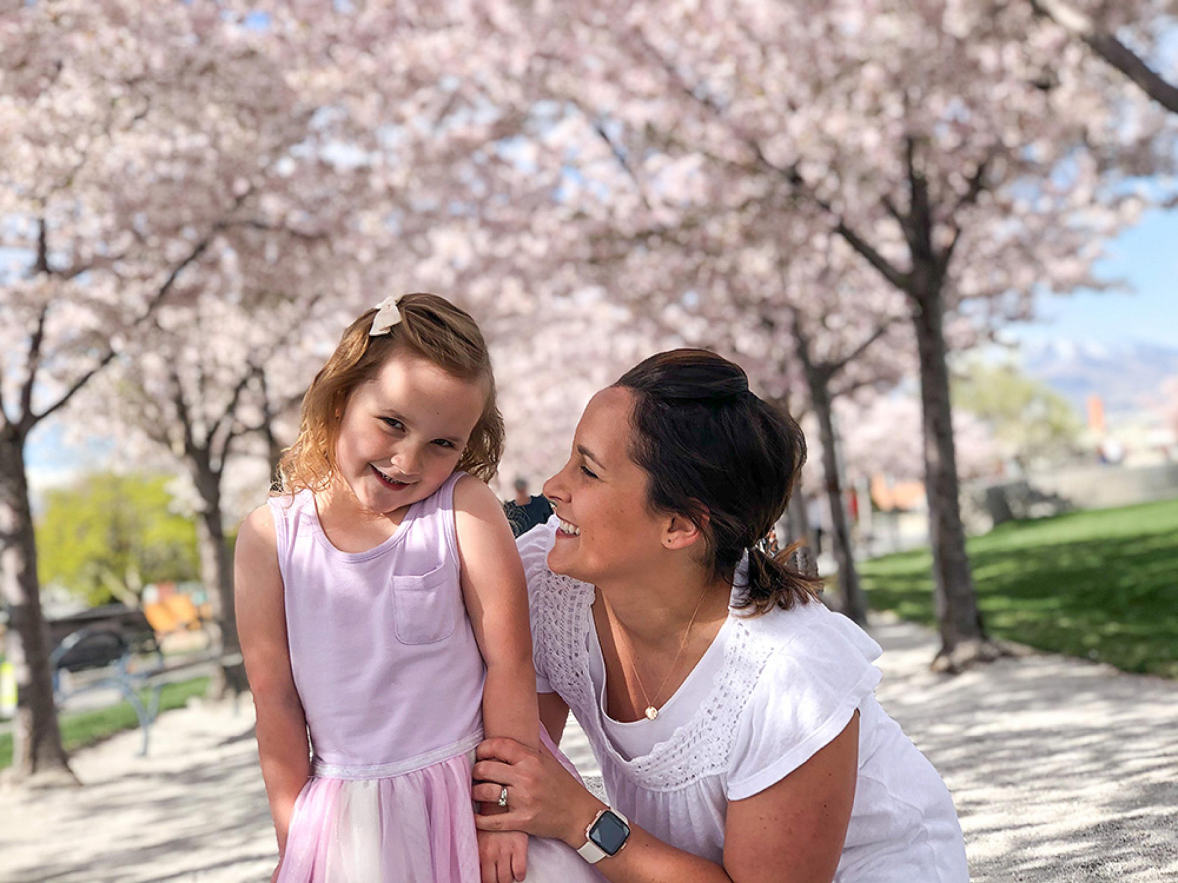 Lisa Lyon and her daughter outside on a sidewalk