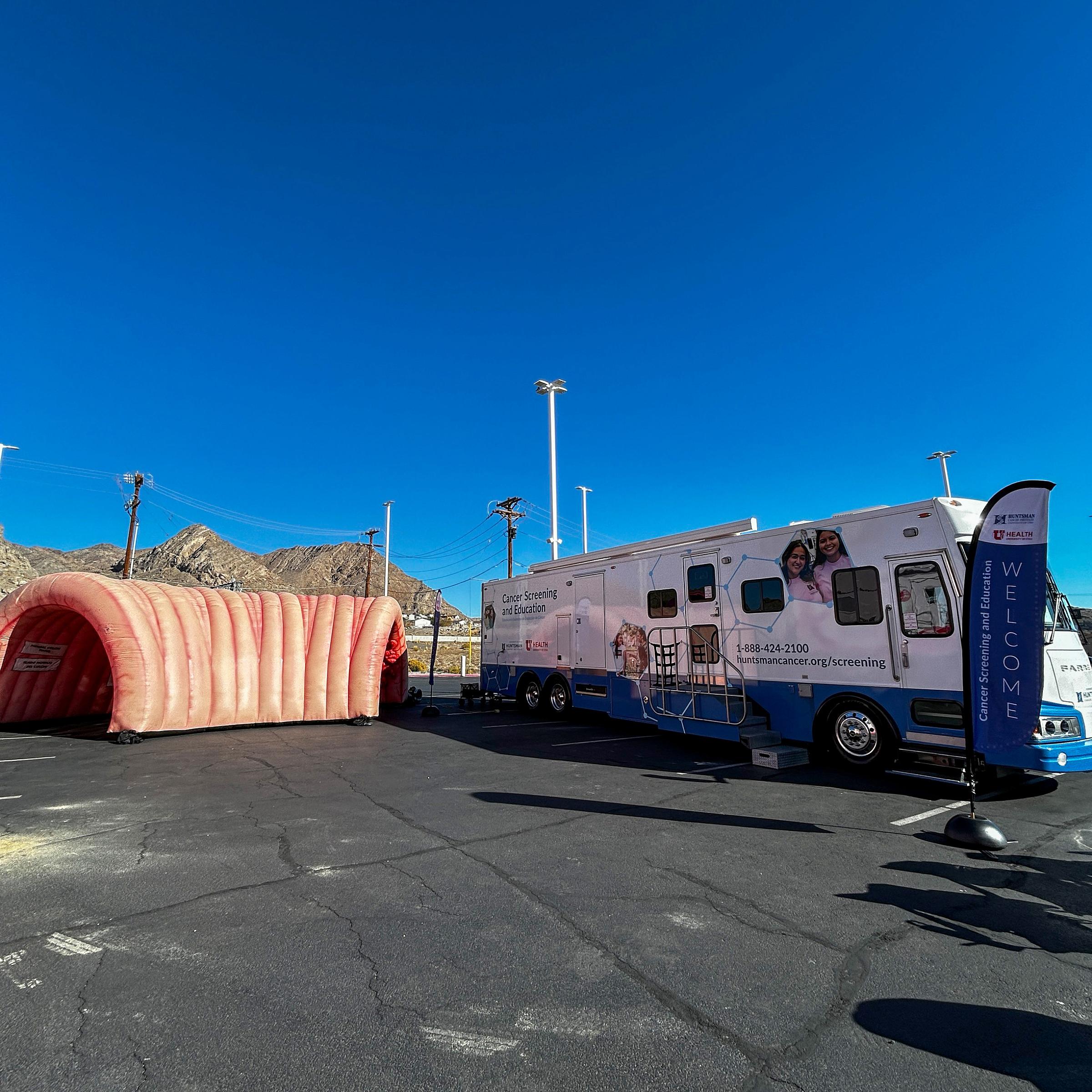 Huntsman Cancer Institute screening bus with a giant inflatable colon