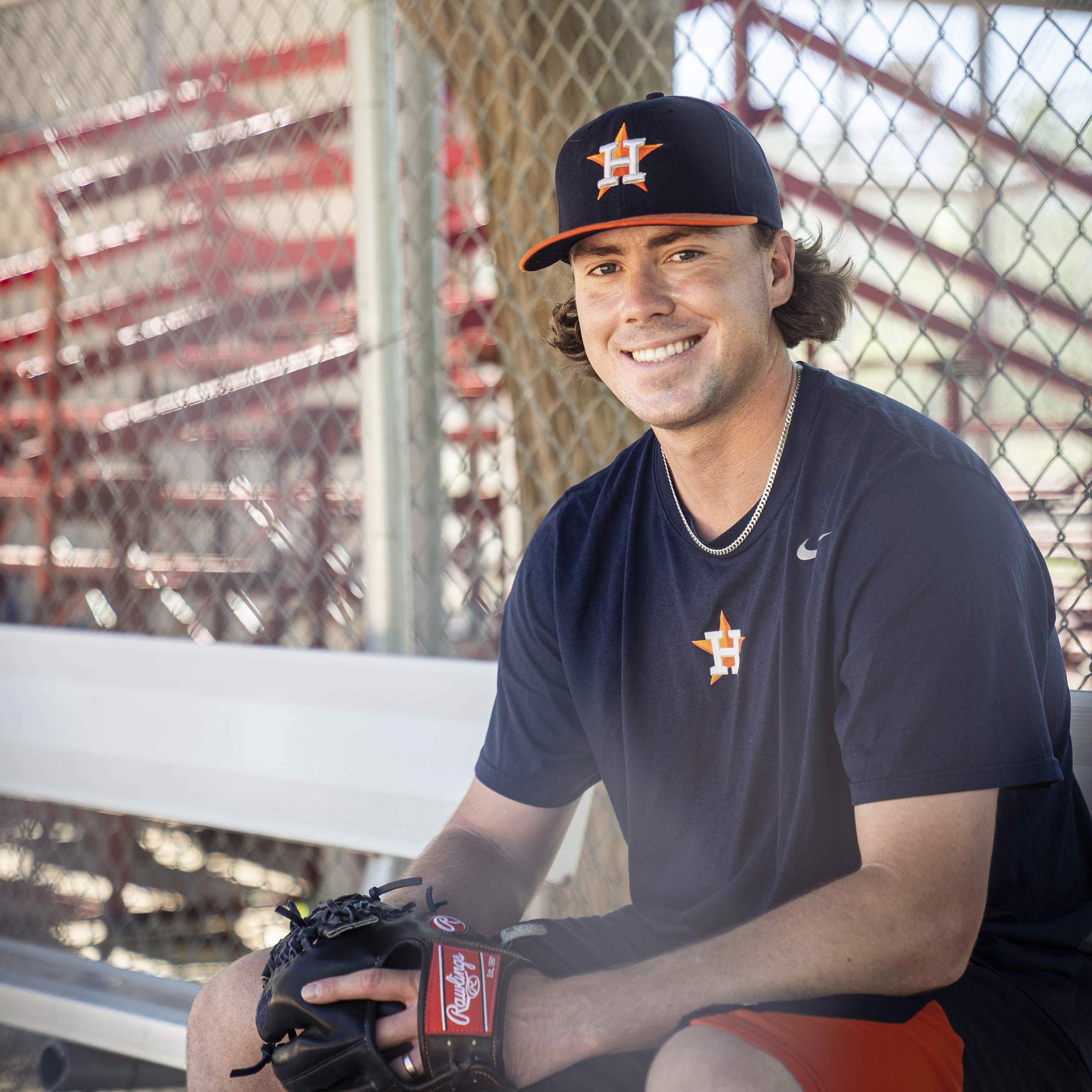 Adam Whitt sits on a bench