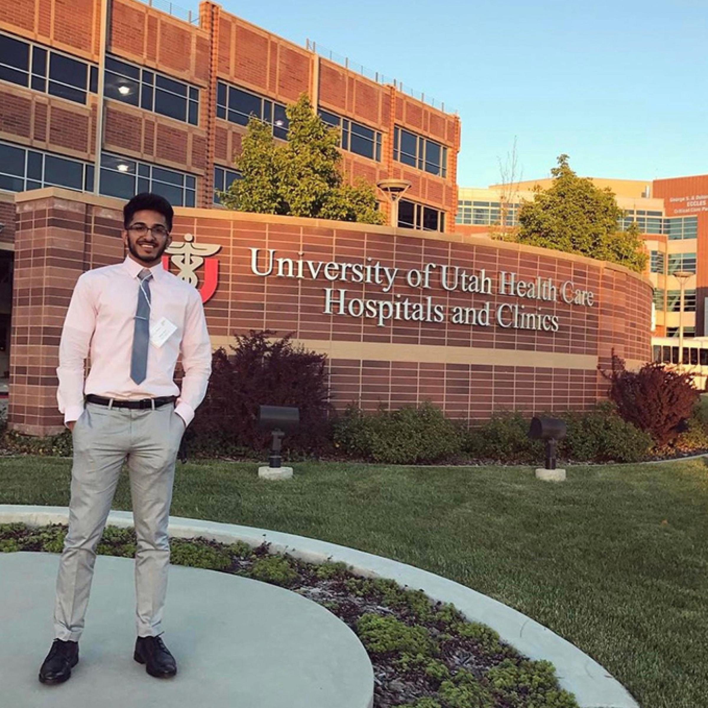 Majid Khan standing outside U of U Healthcare building