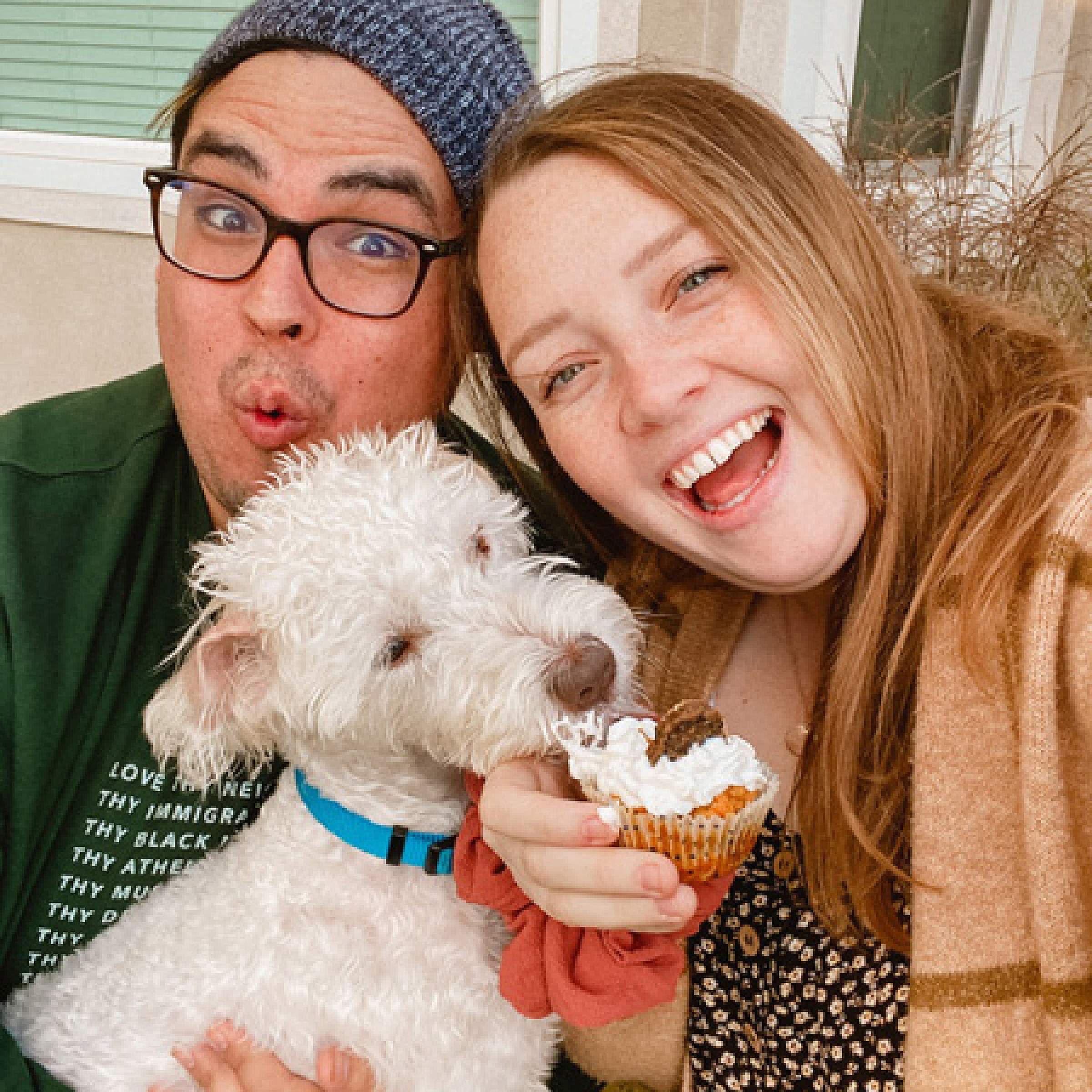 Shay and Tanner take picture with their dog