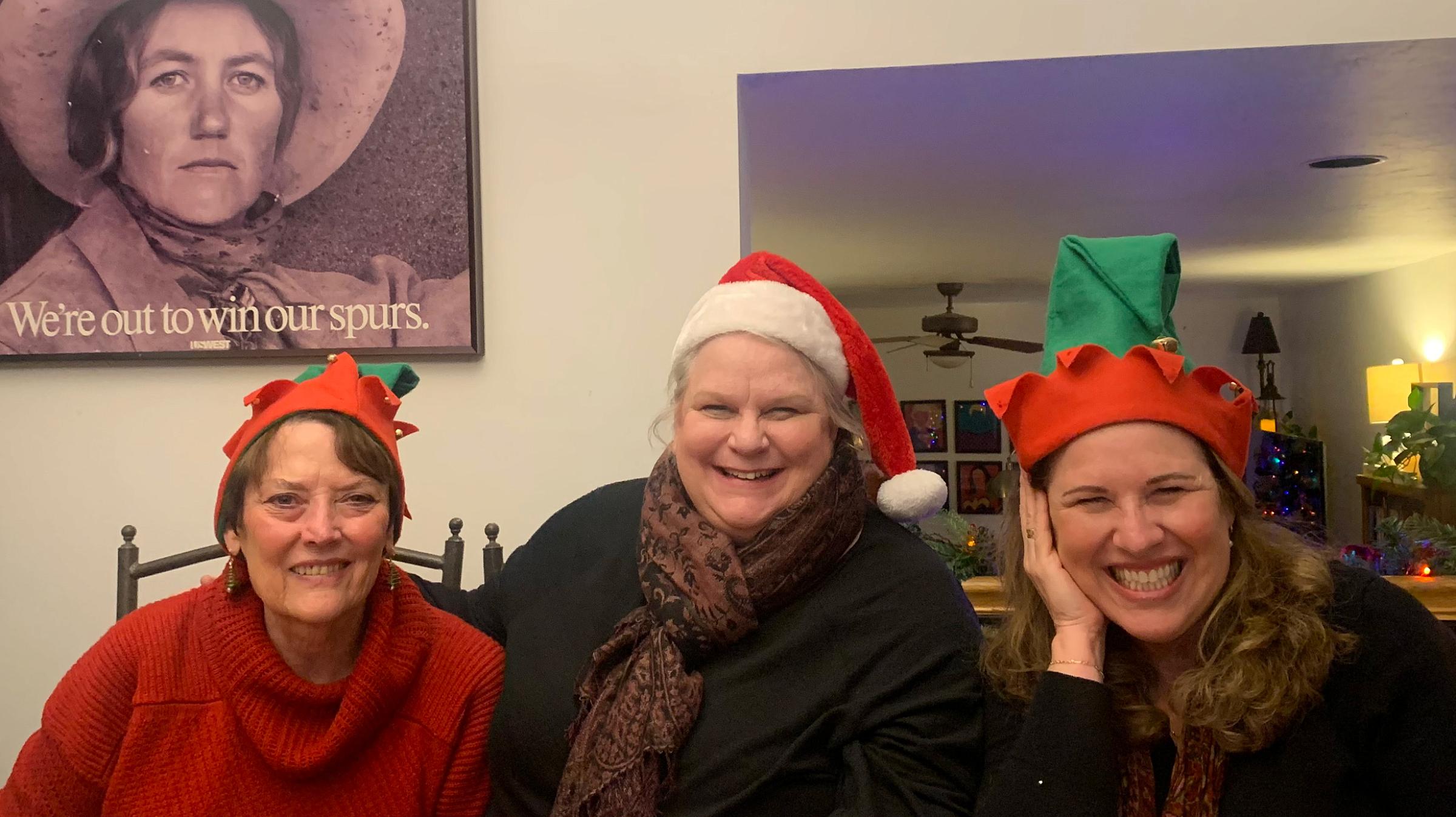 Advocates Linda James, Deb Jordan, and Rebecca Cressman celebrate at the annual BGCRA holiday party.
