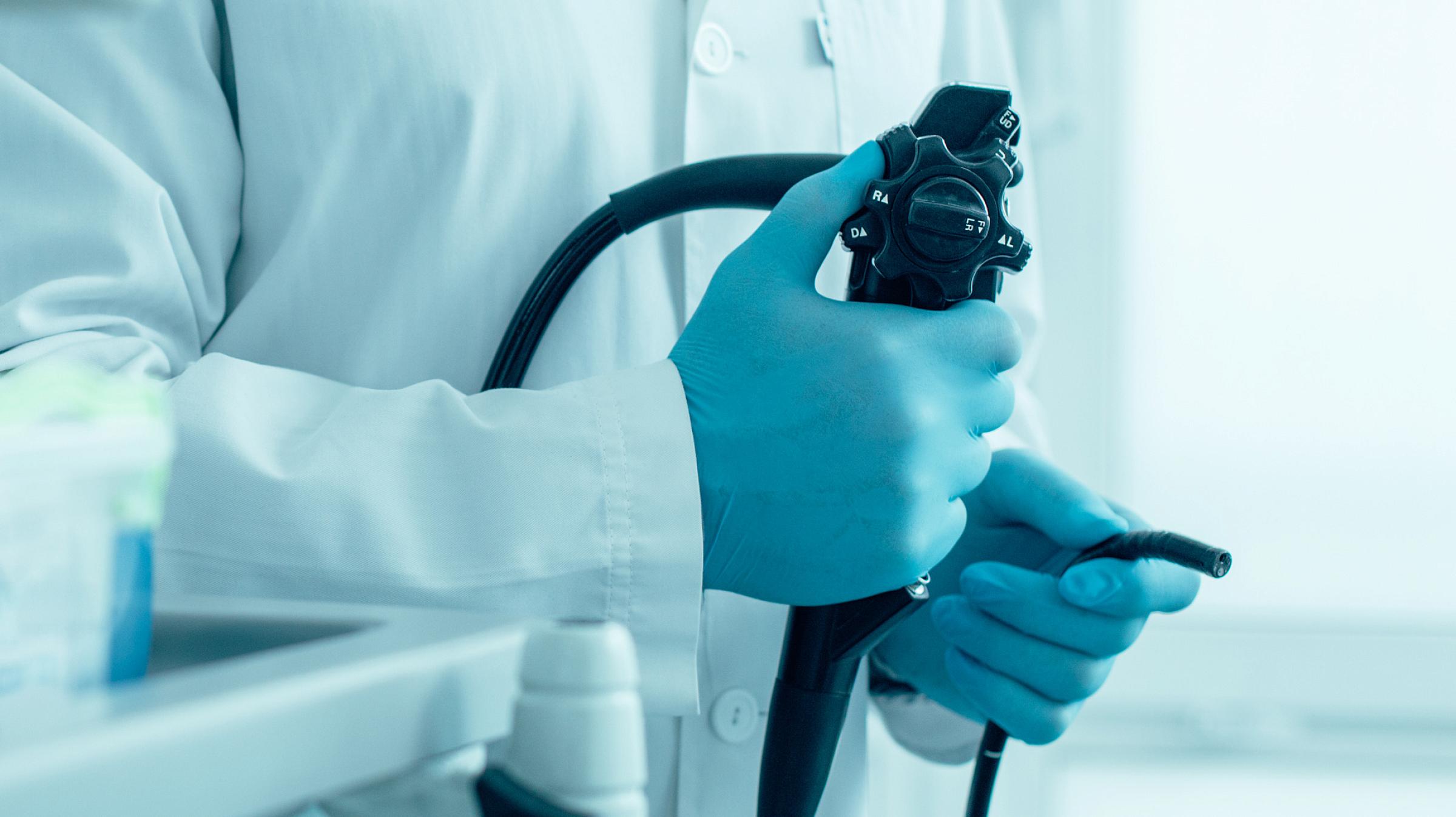 Doctor holding colonoscopy scope