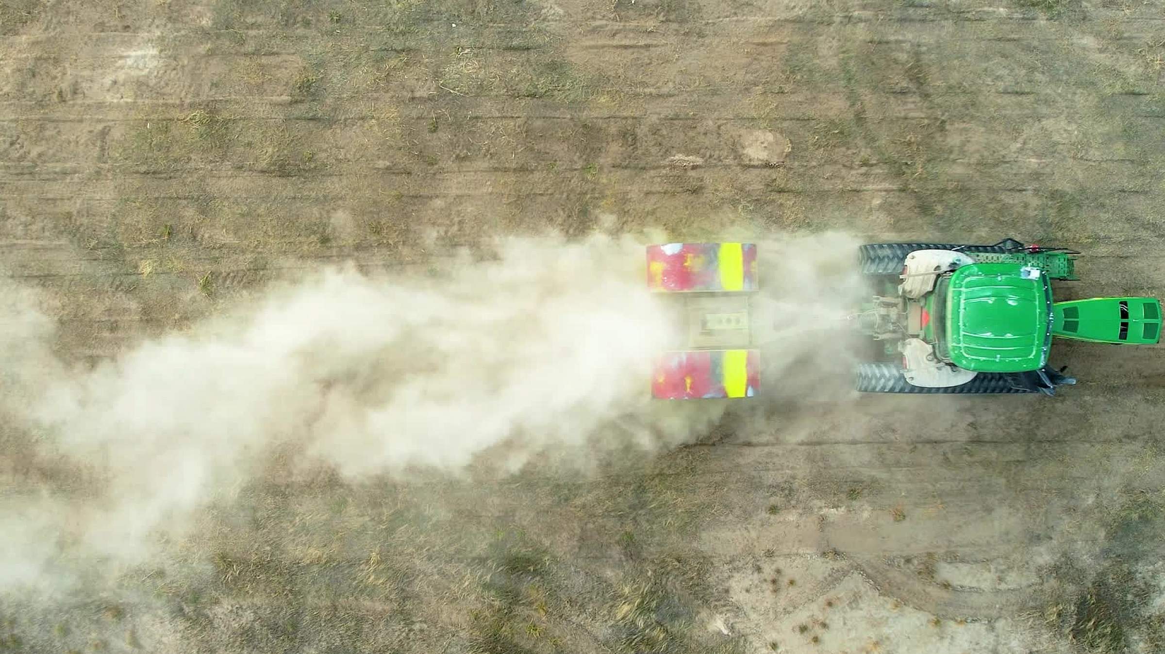 Overhead view of machine driving across the future Vineyard location