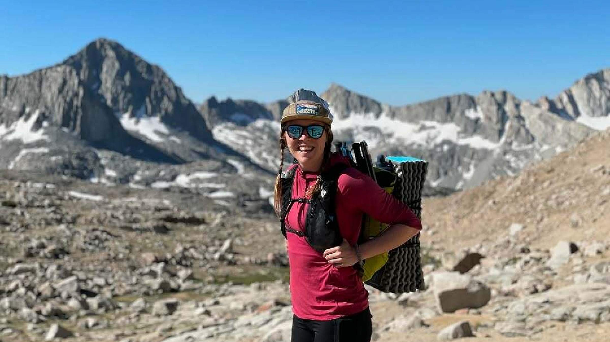 Caroline Himbert hiking in the mountains. 