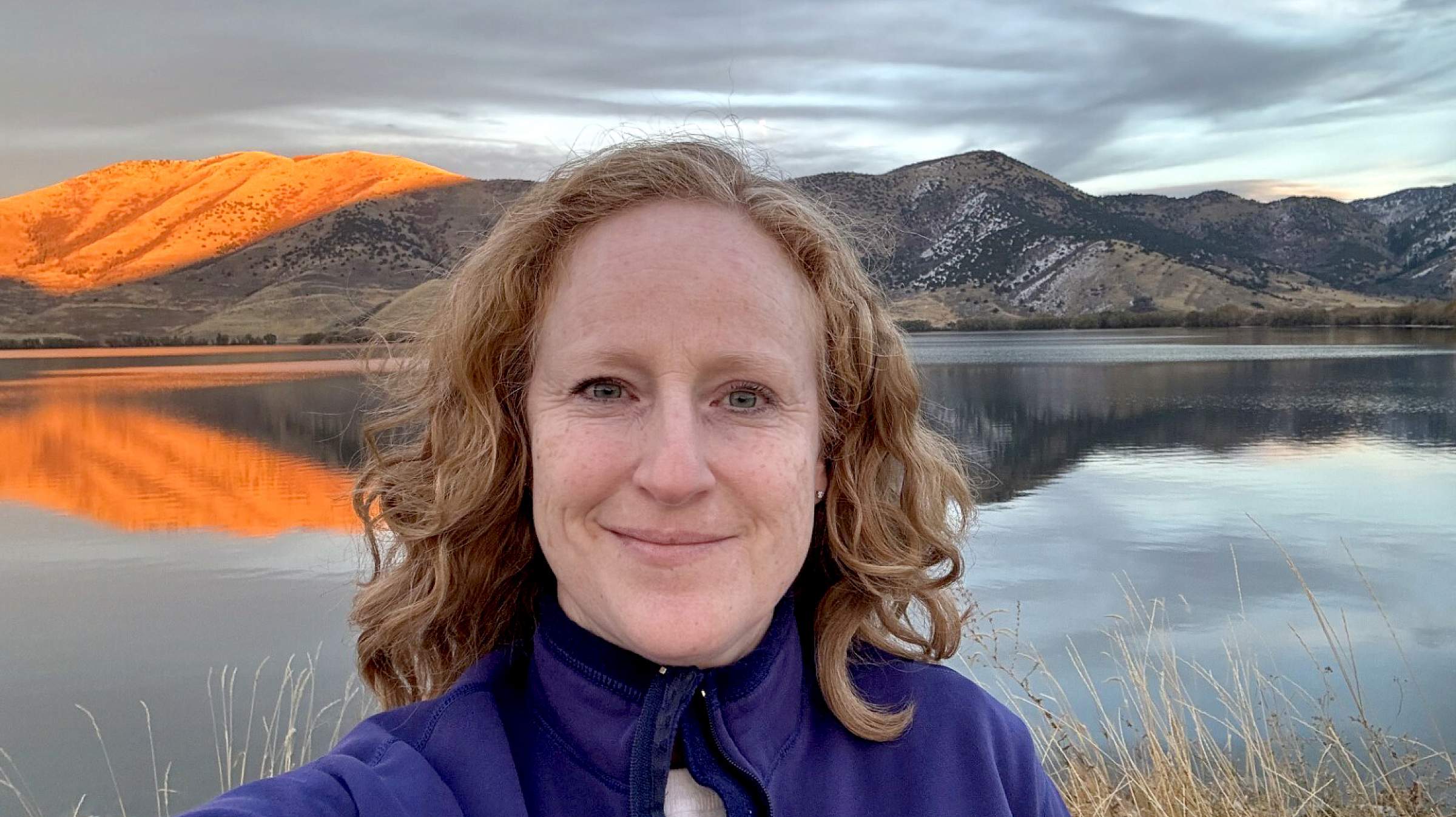 Emily Erickson in front of a lake