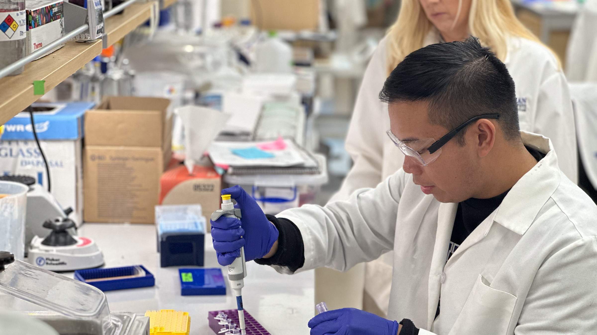 Researchers looking at slides