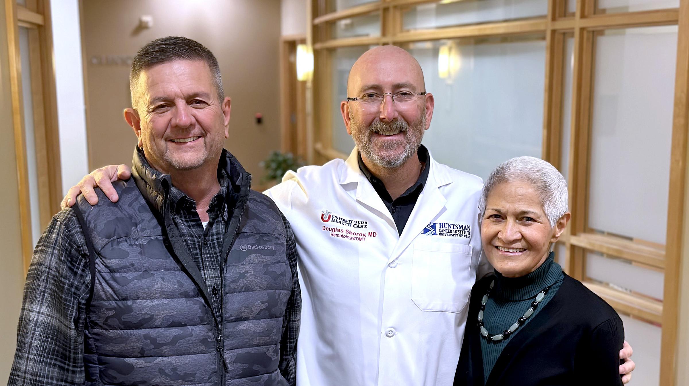 Jeanette Nielsen, multiple myeloma patient, and her husband, Doug, with Douglas Sborov, MD, MS, director of the Multiple Myeloma Program