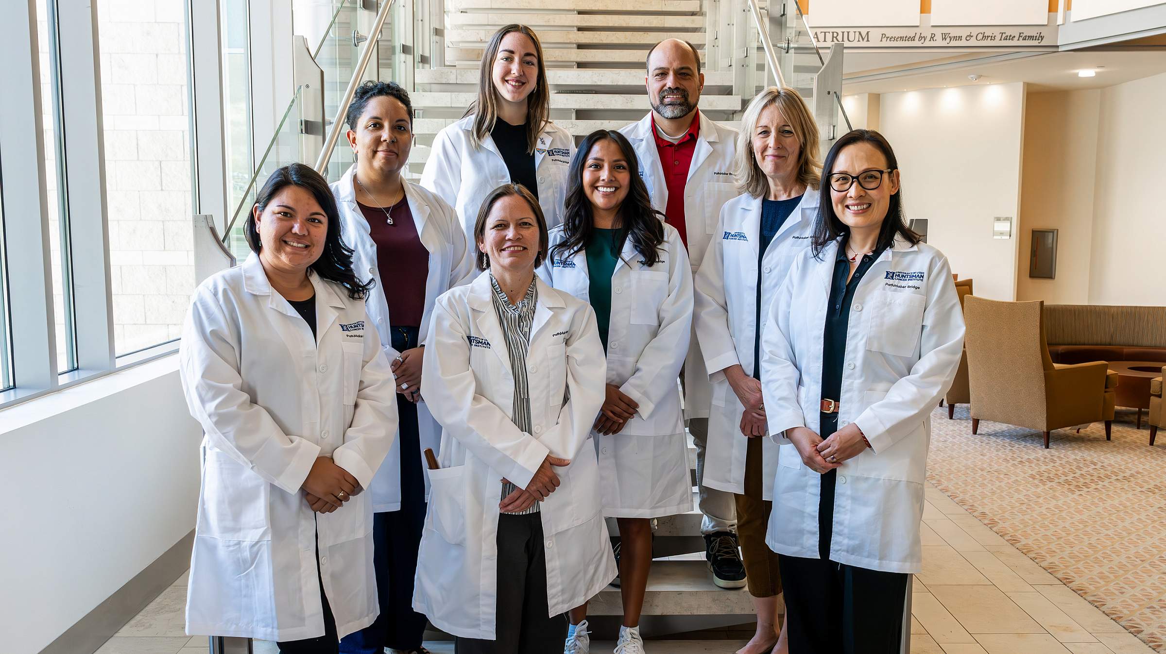 The PathMaker Bridge program members pose for a photo in Huntsman Cancer Institute