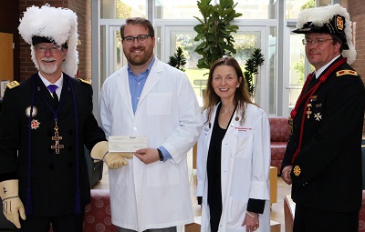 From left: Dean D. Rein, Colin Bretz, Mary Elizabeth Hartnett, and Douglas Backus.