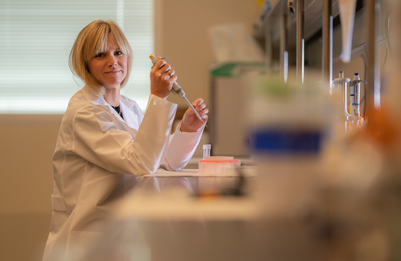 Leah A. Owen, MD, PhD, is pictured in her laboratory at the Moran Eye Center.