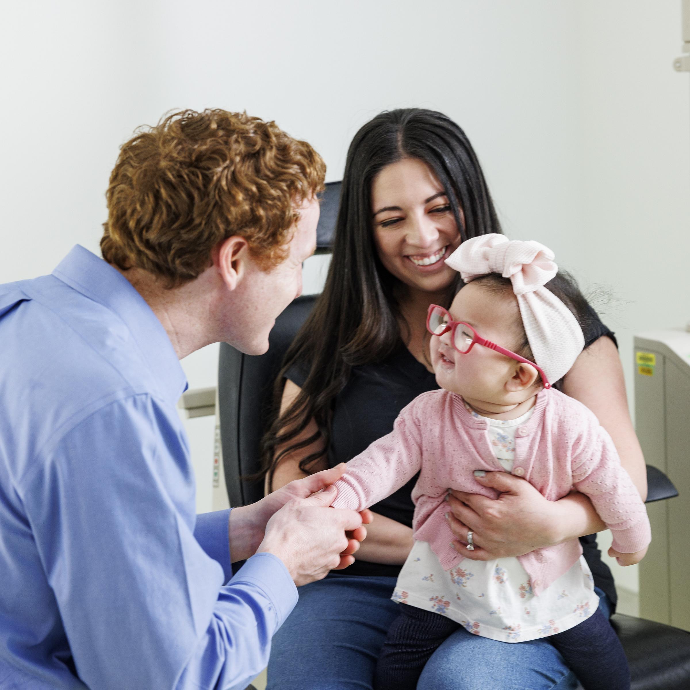 Dr. Griffin Jardine examines a patient at the new Lehi pediatric clinic.