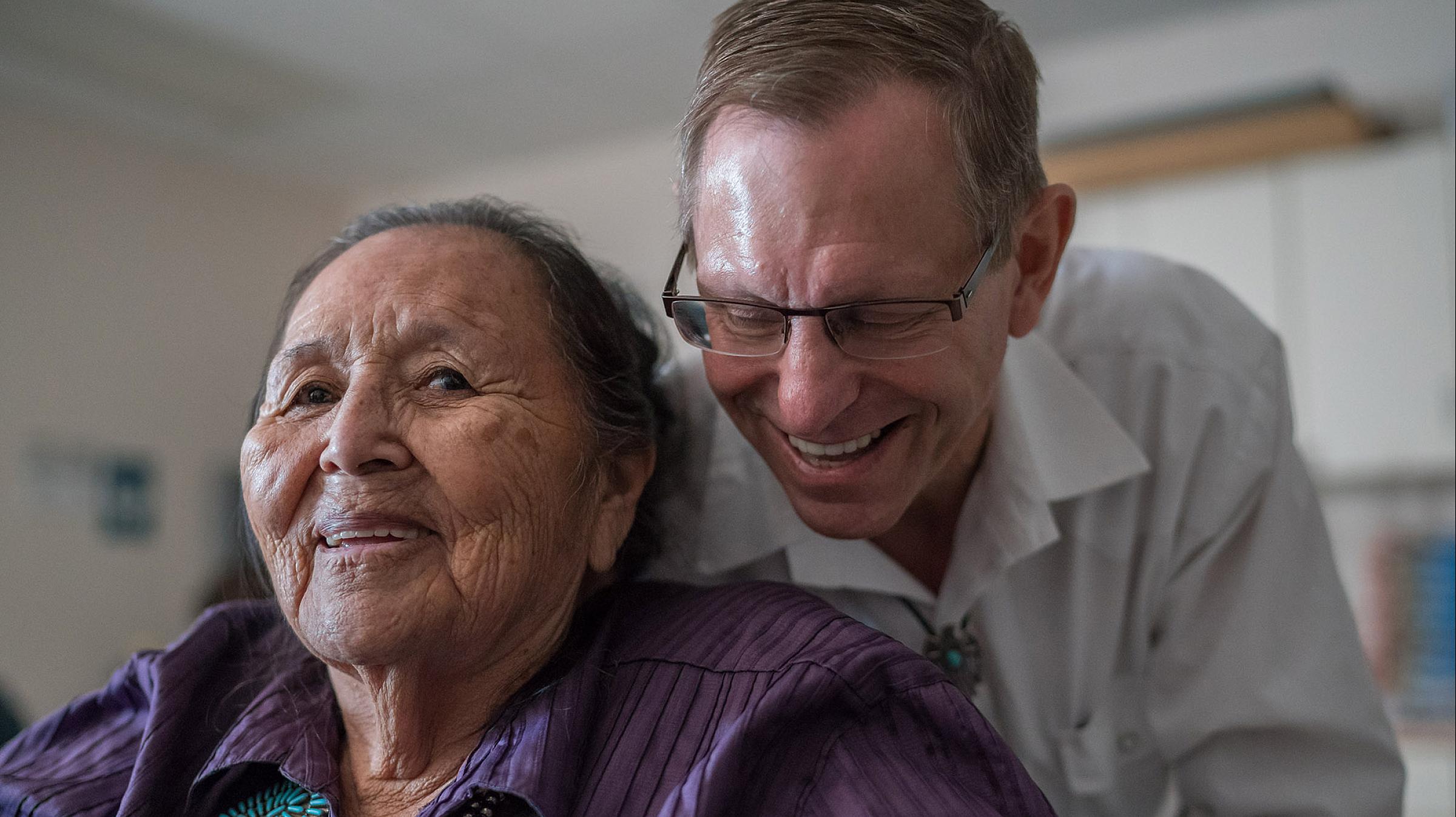 Dr. Crandall with a patient during an outreach trip to the Utah strip of the Navajo Nation.