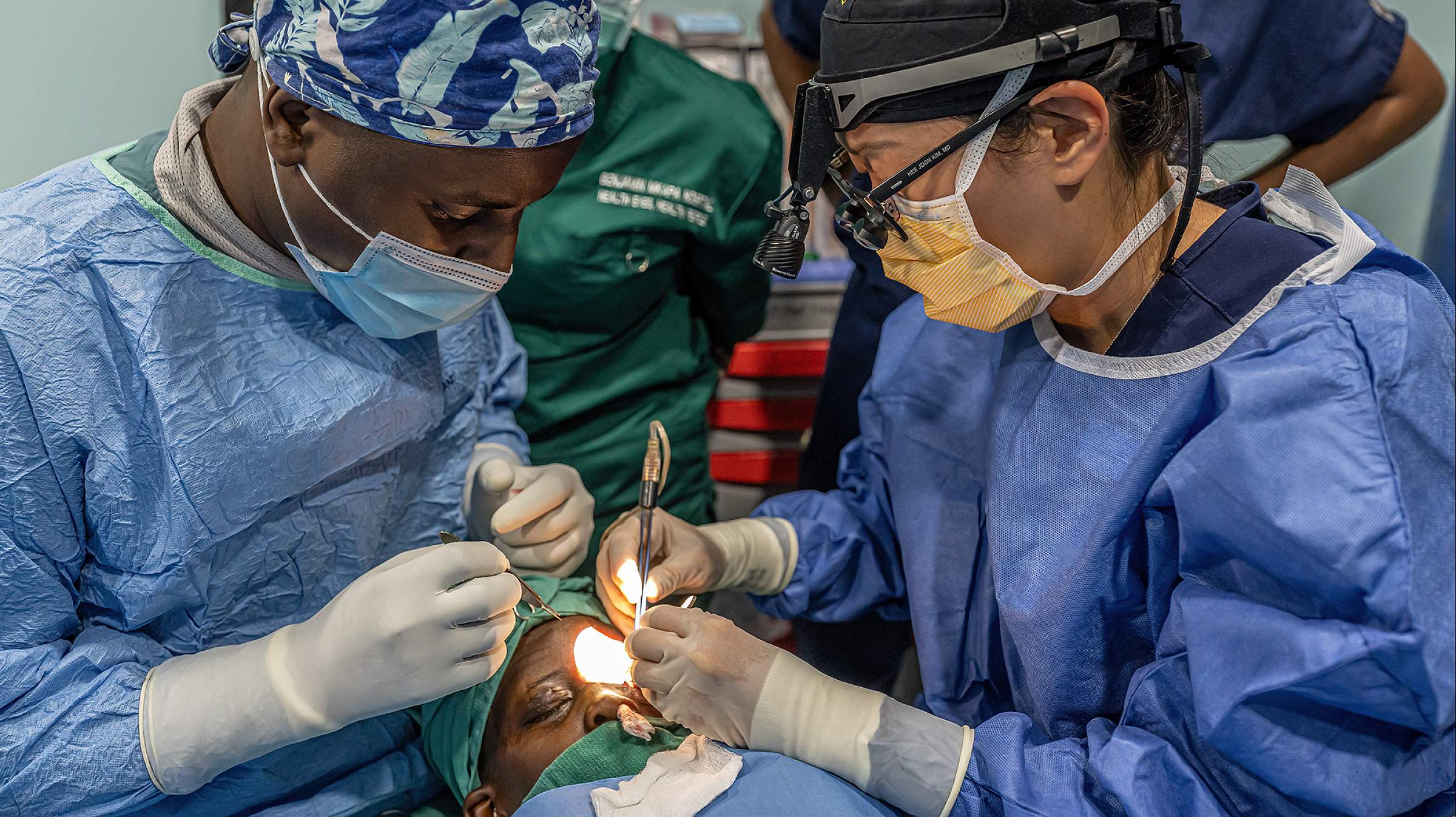 Dr. Jun Kim performs surgery in Tanzania.