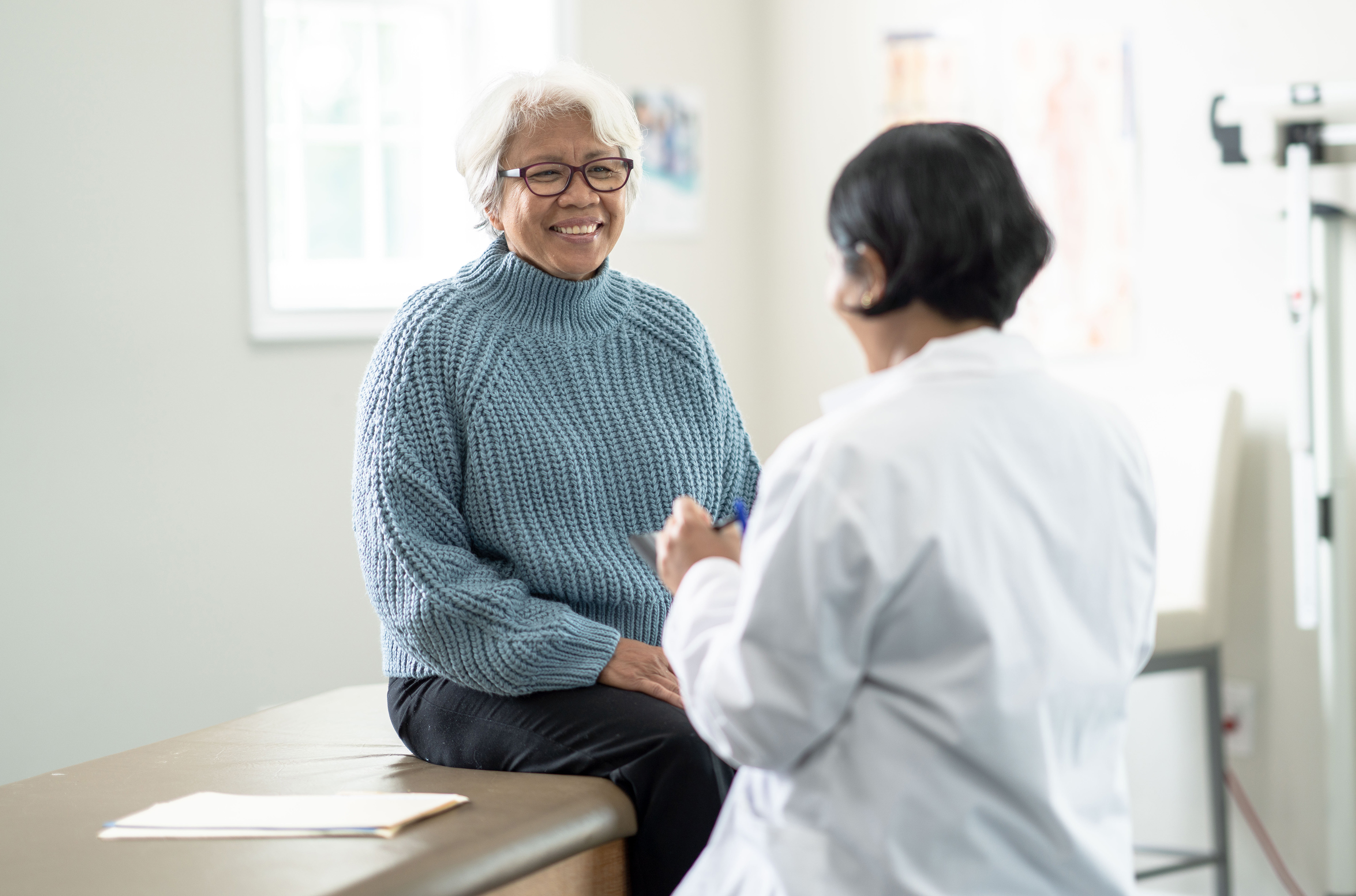Doctor speaking with patient