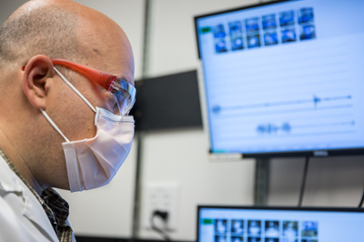 Researcher looking at data