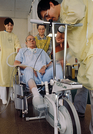 Clark Riding Exercise Bike After Surgery