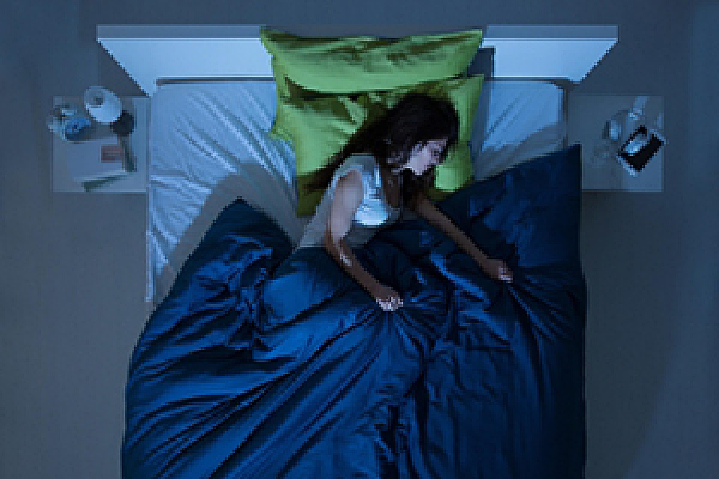 Woman asleep in bed