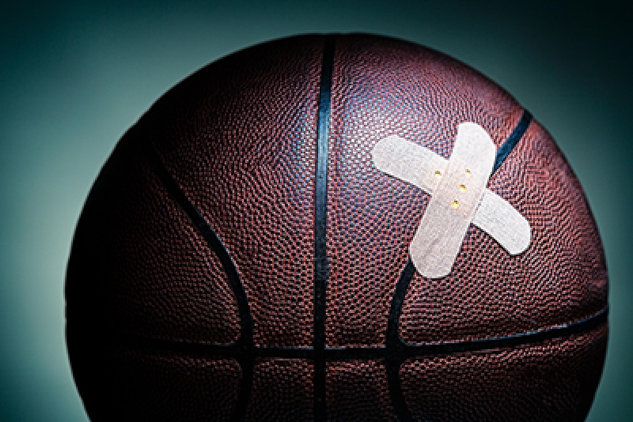 Basketball with band aids