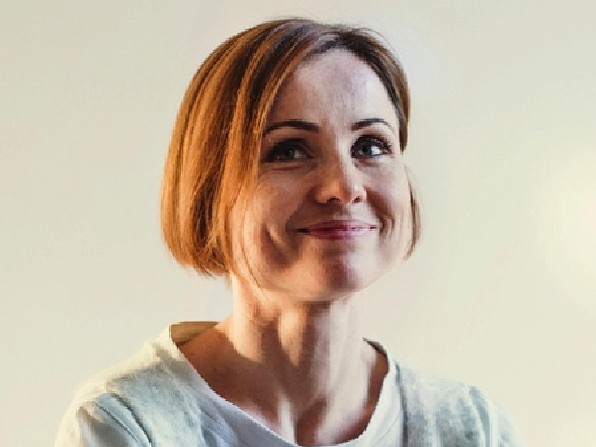 Picture of woman with red hair smiling