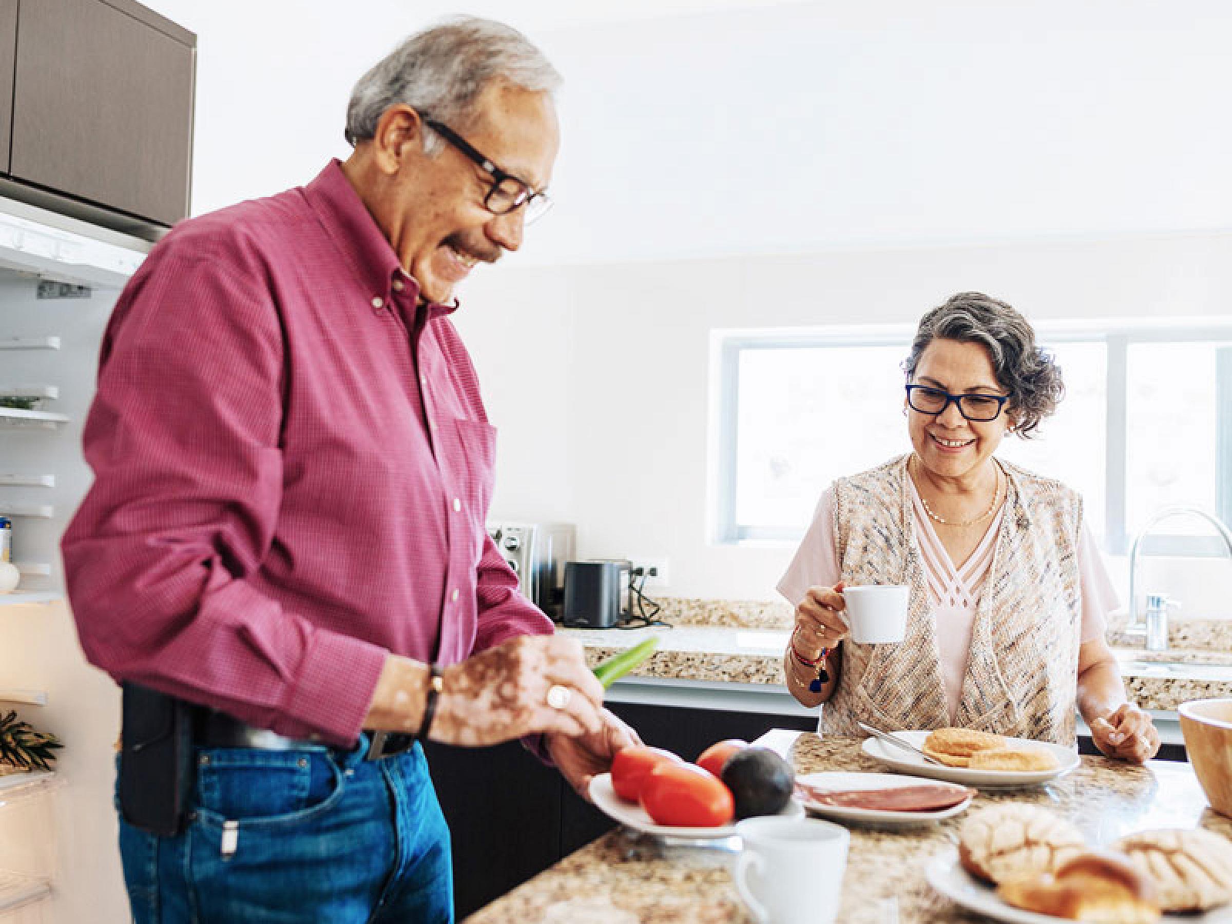 Latino couple making a meal