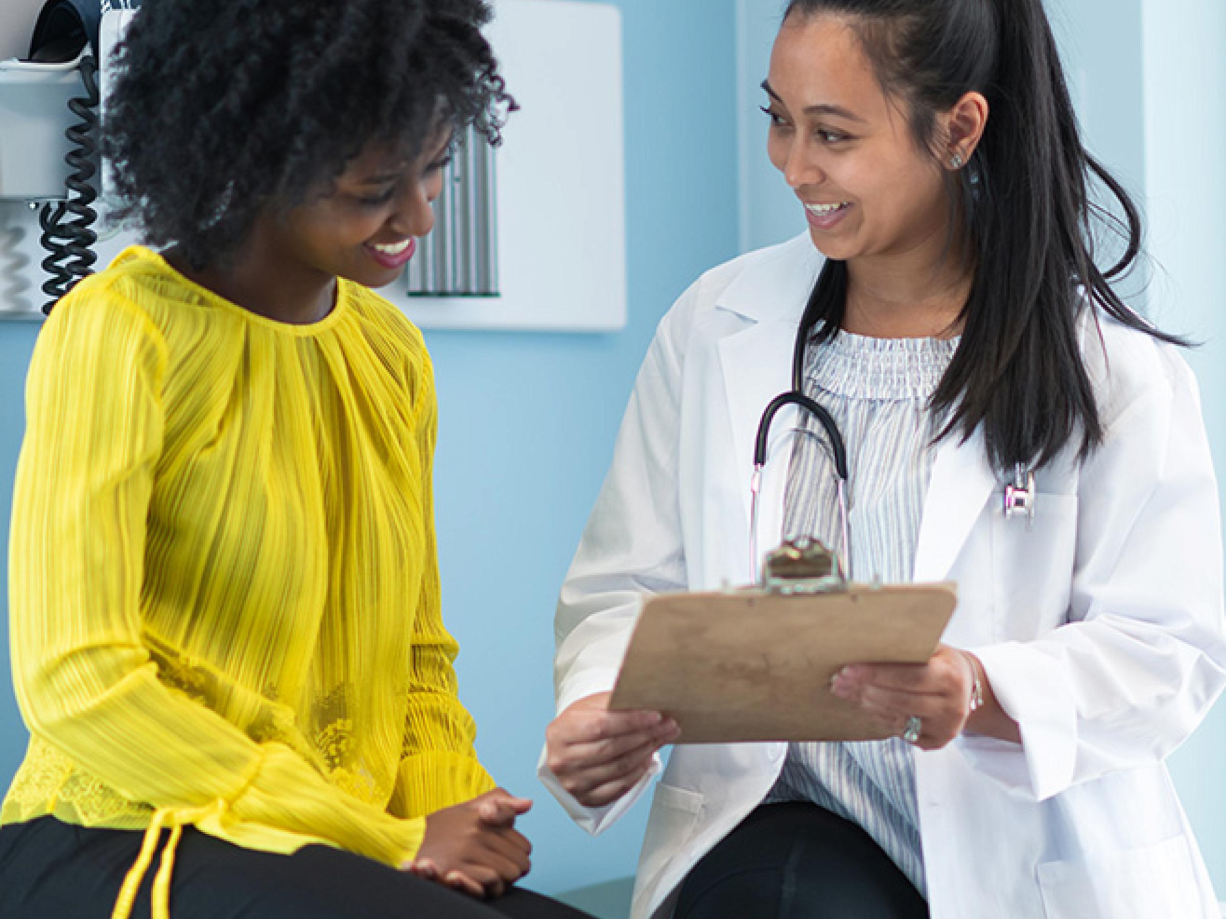 female patient with doctor