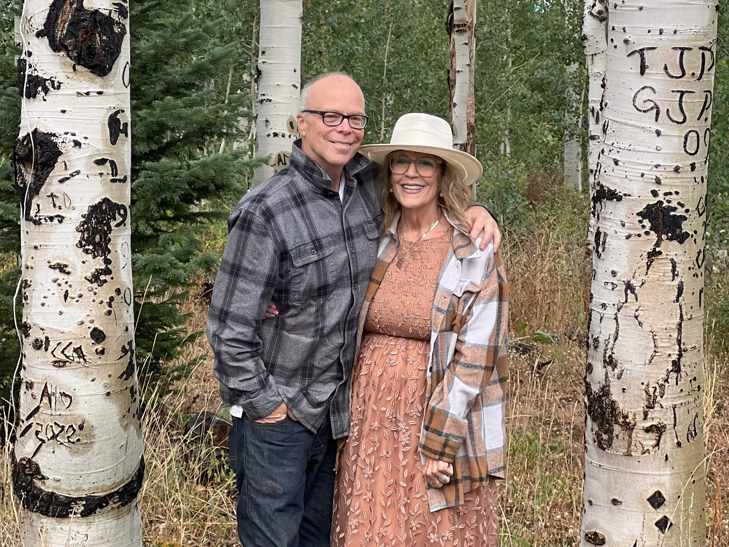 Joseph McComber outdoors with his wife Cynthia