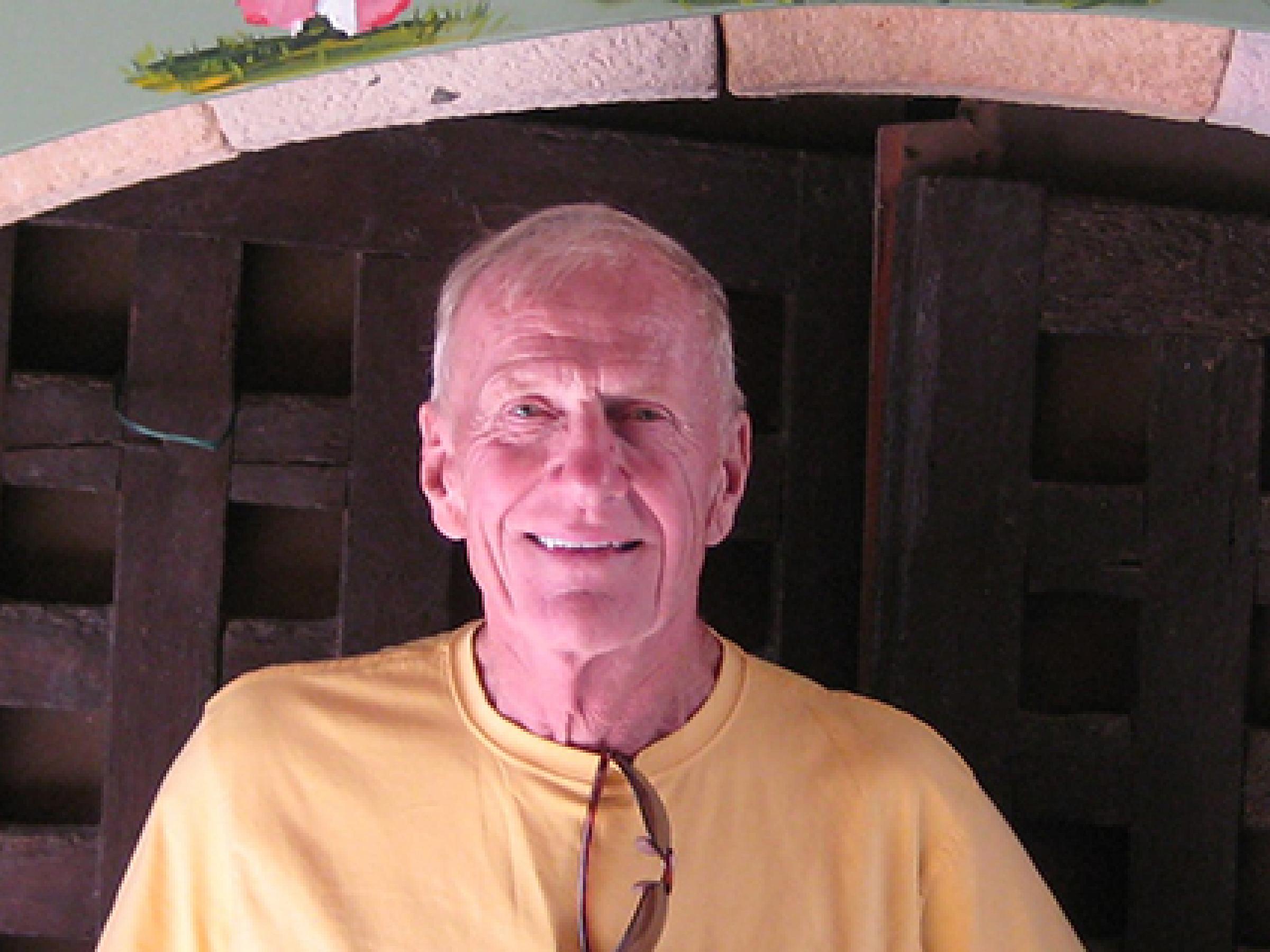 Ken Martin, LVAD patient (pictured in front of brown door)
