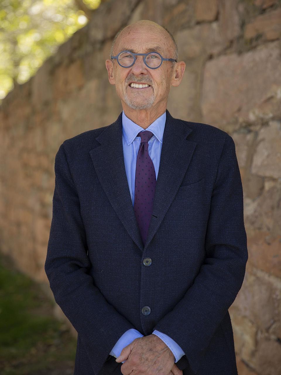 Ross VanVankren headshot in front of HMHI wall