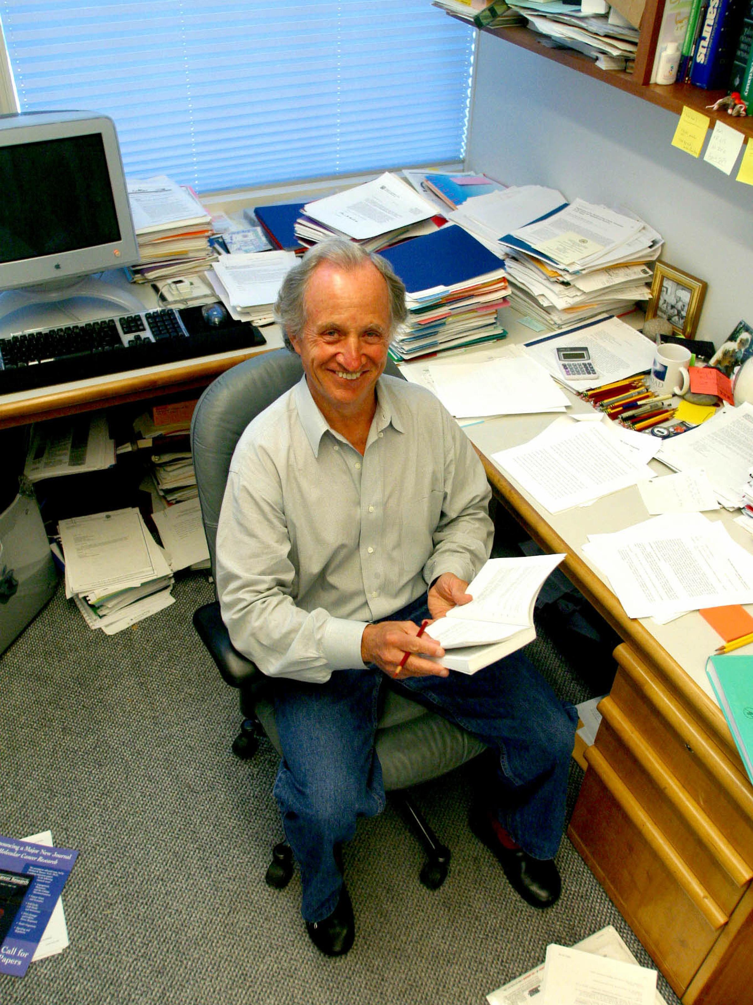Mario Capecchi in his office
