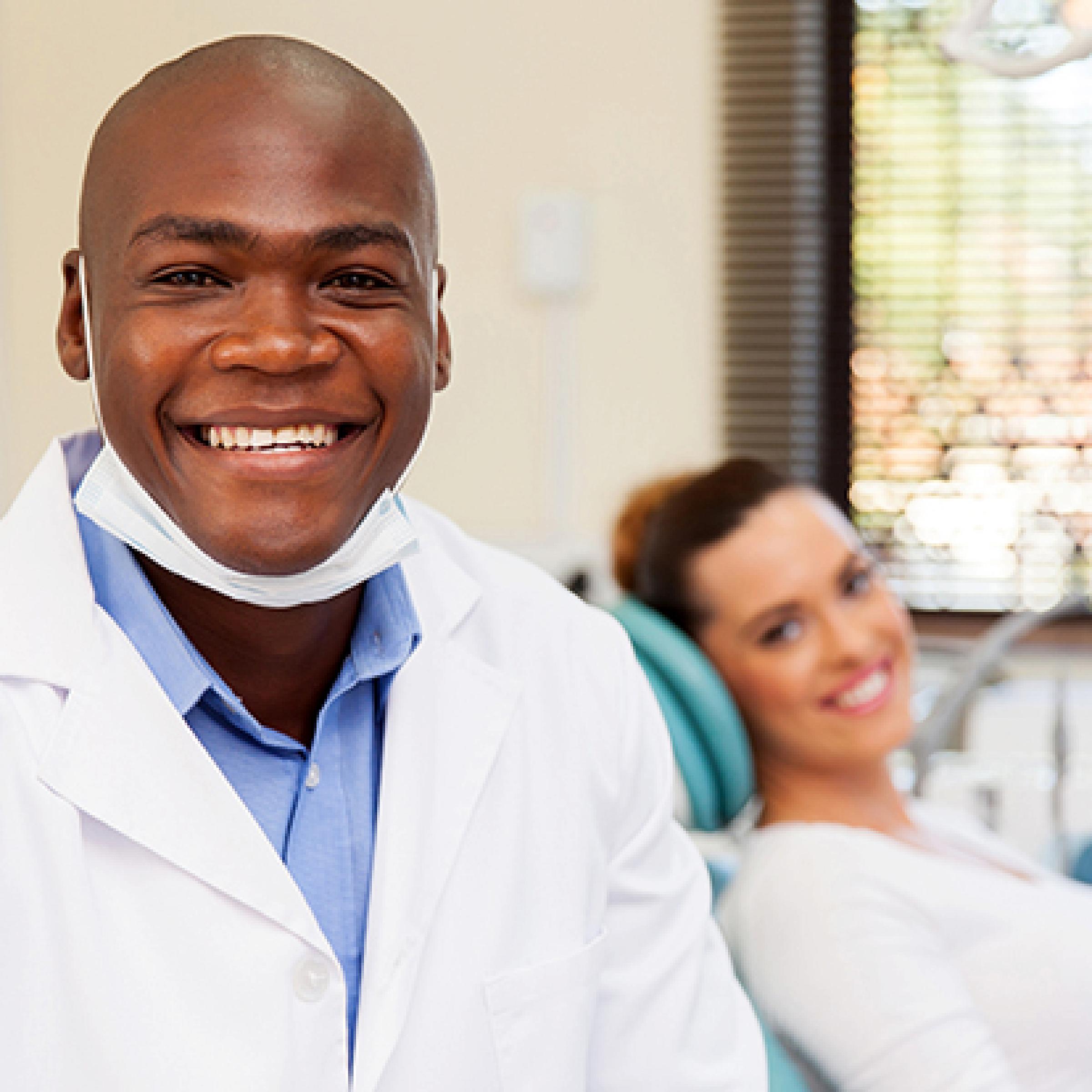 Dental resident with patient
