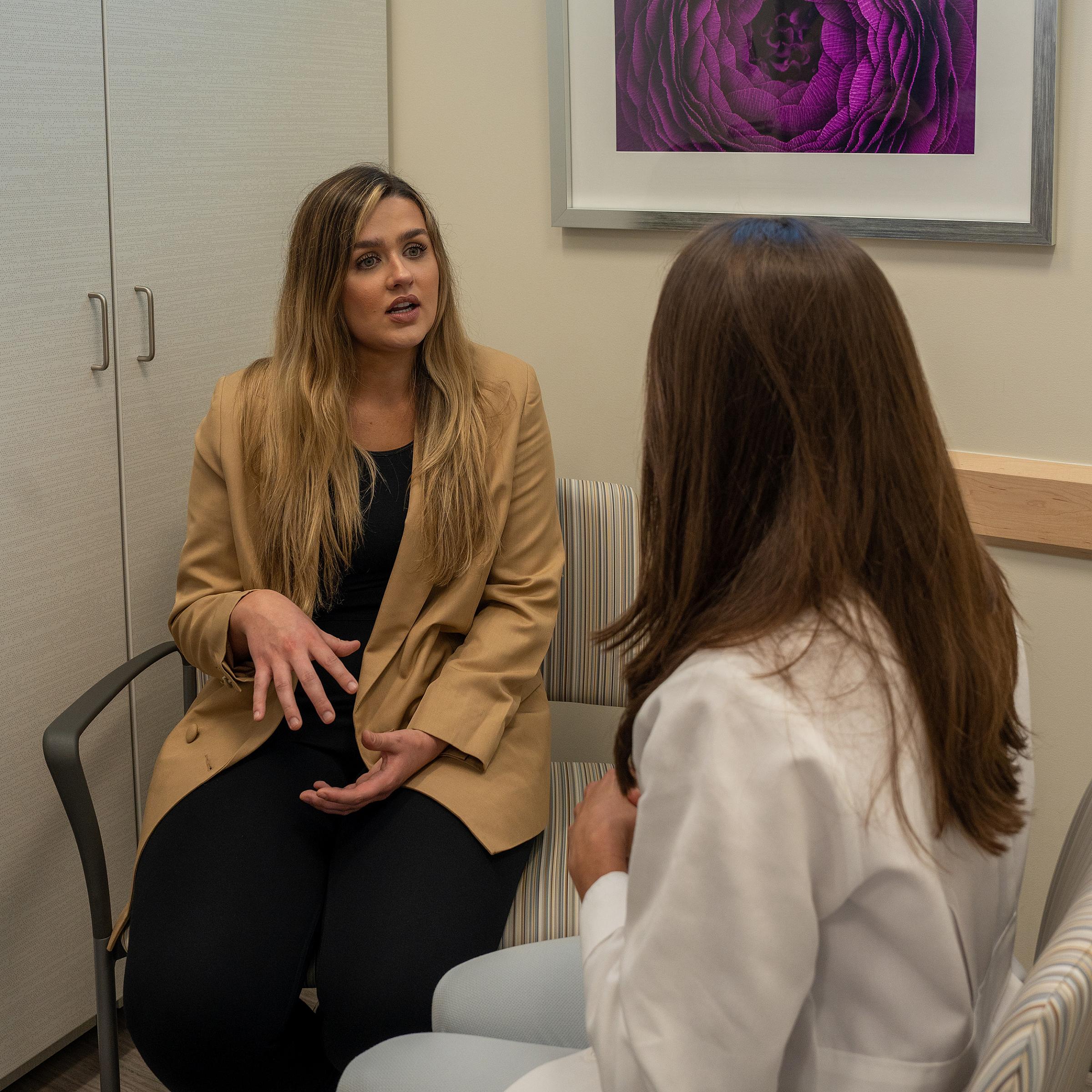 Patient Ashlee talking with U of U Health Doctor