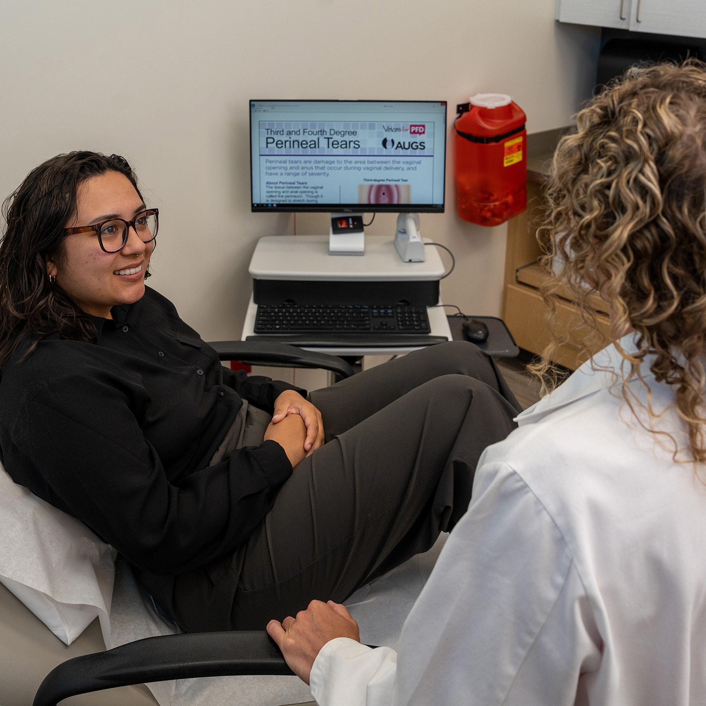 Postpartum patient consults with U of U Health doctor Jolyn Hill,MD