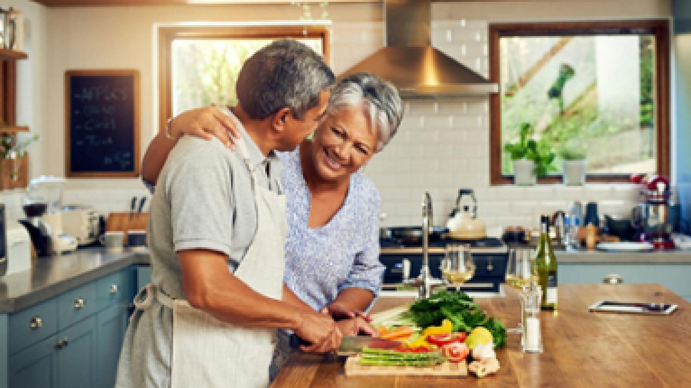 Older couple cooking together